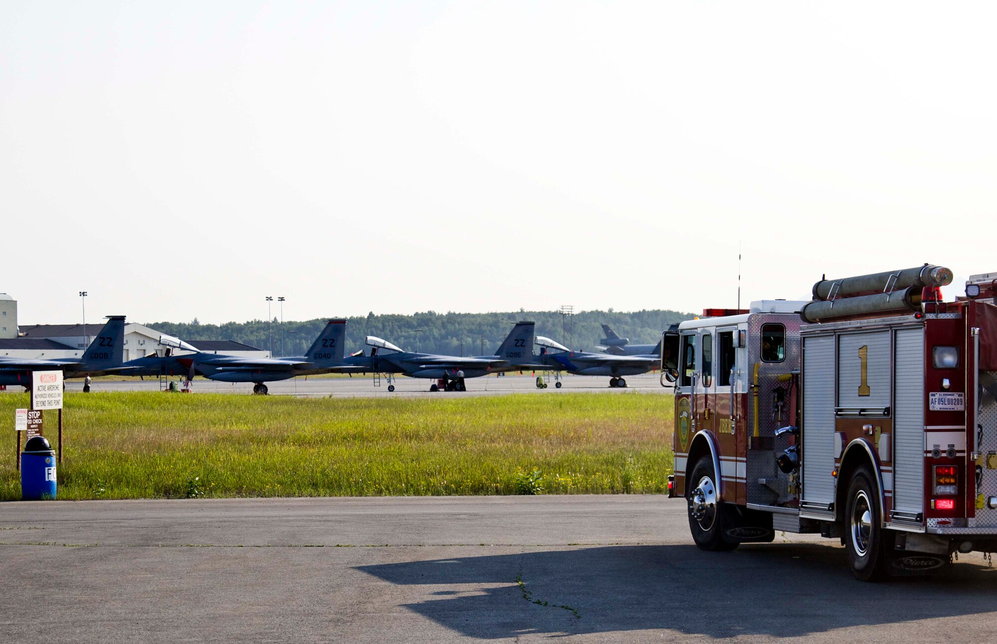 U.S. Air Force firefighters with the 673rd Civil Engineer Squadron, answer a Flight Line 911 call during Exercise Northern Edge 2015 at Joint Base Elmendorf-Richardson, Alaska, June 23, 2015. NE15 is Alaska’s premier joint training exercise designed to practice operations, techniques and procedures as well as enhance interoperability among the services. Thousands of participants from all services from active duty, Reserve and National Guard units are involved. (U.S. Army photo by Sgt. Brian Ragin/Released)