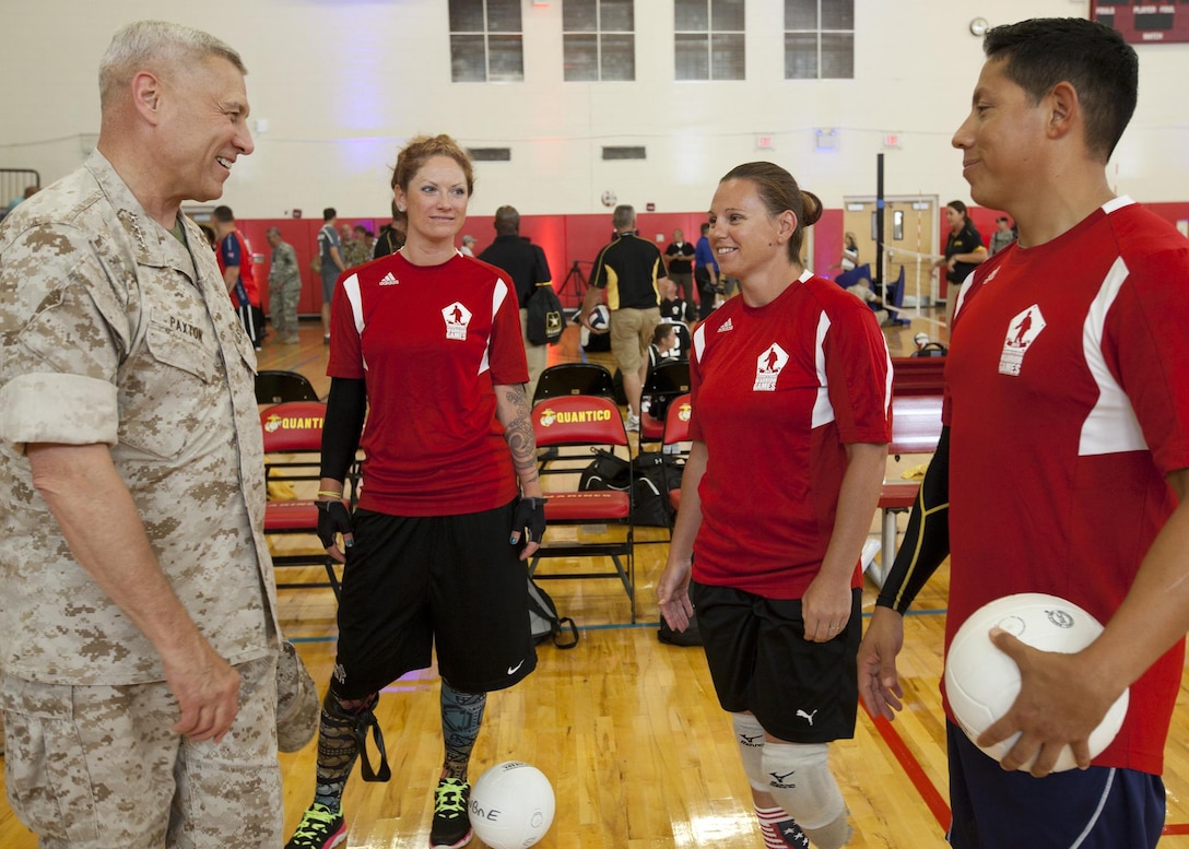The Assistant Commandant of the U.S. Marine Corps, Gen. John M. Paxton, Jr., visits with competitors, volunteers and medical personnel during the Department of Defense Warrior Games on Marine Corps Base Quantico, Va., June 25, 2015. (U.S. Marine Corps photo by Sgt. Tia Dufour/Released)