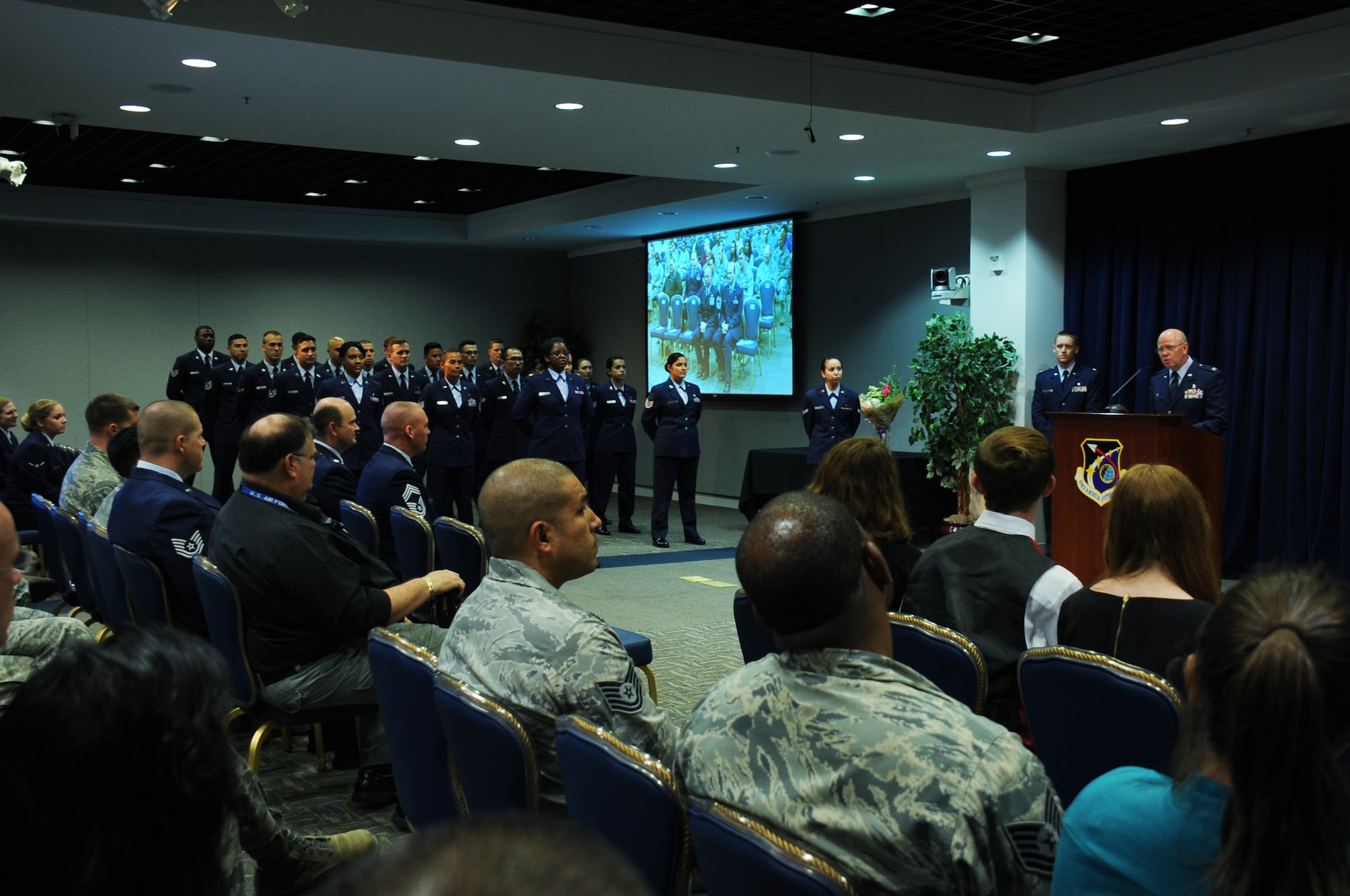 Col. (Dr.) Paul Hoerner, incoming commander of the 61st Medical Squadron at Air Force Space Command's Space and Missile Systems Center, Los Angeles Air Force Base in El Segundo, Calif. address the audience at the Gordon Conference Center during his Assumption of Command ceremony June 26. Hoerner is responsible for ensuring more than 1,200 active duty personnel assigned to SMC and LAAFB are medically fit and ready for contingency (natural disasters and wartime) operations. He commands a staff of 178 active duty, government civilians and contract medical staff providing care for more than 171,000 eligible patients across the greater Los Angeles metropolitan area. (U.S. Air Force photo/Van Ha) 