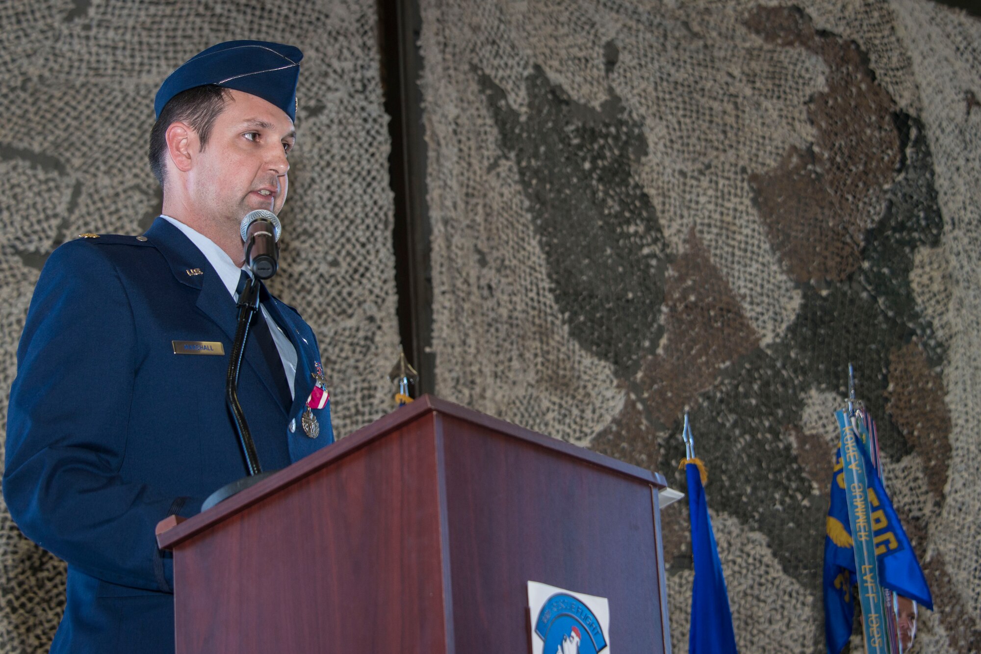Maj. Jennings Marshall, former 36th Rescue Flight commander, thanks his Airmen, friends, coworkers and family for their dedication to the mission and teamwork during the 36th Rescue Flight change of command ceremony June 25, 2015, at Fairchild Air Force Base, Wash. Jennings has deployed in support of Operations Iraqi Freedom and New Dawn, and has been immersed in the helicopter mission for nearly 15 years. (U.S. Air Force photo/Staff Sgt. Benjamin W. Stratton)