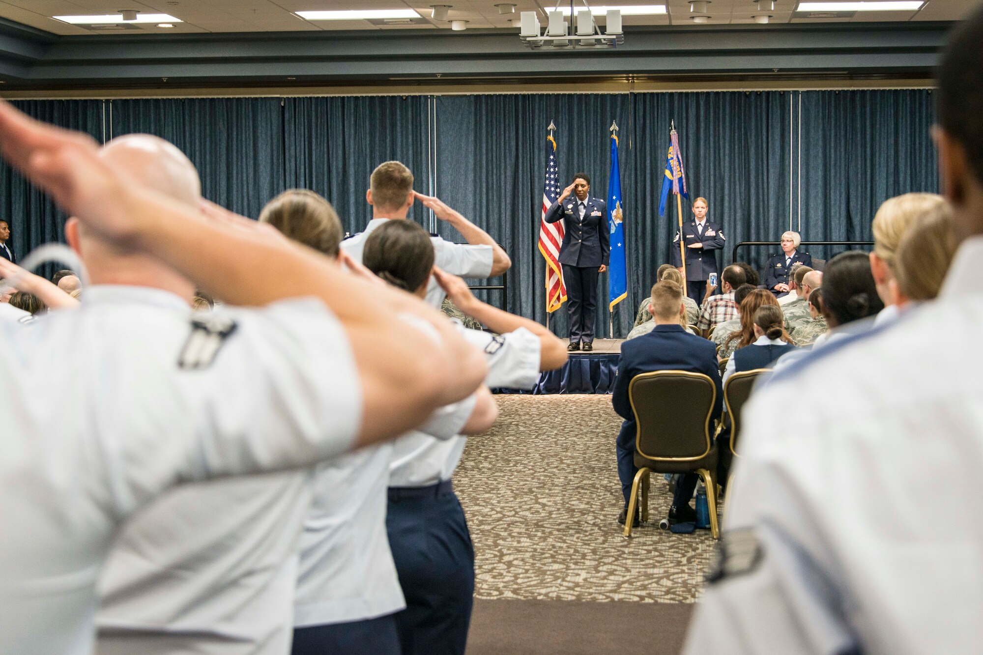 Lt. Col. Felicia Burks, 92nd Medical Support Squadron commander, salutes a formation of 92nd MDSS Airmen during the 92nd MDSS change of command ceremony June 26, 2015, at Fairchild Air Force Base, Wash. Burks joins Team Fairchild from her previous position as the 673rd Medical Group rescue management flight commander at Joint Base Elmendorf-Richardson, Alaska. (U.S. Air Force photo/Staff Sgt. Benjamin W. Stratton)