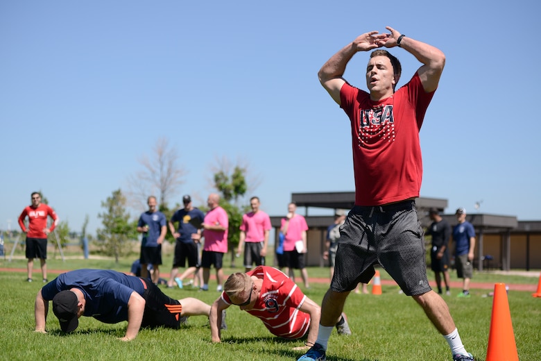 Participants compete in the obstacle course event during the 4-Fit Challenge held here June 19. The 4th Space Operations Squadron claimed its ninth straight victory during the tenth annual 4-Fit Challenge. (U.S. Air Force photo by Chris Dewitt)