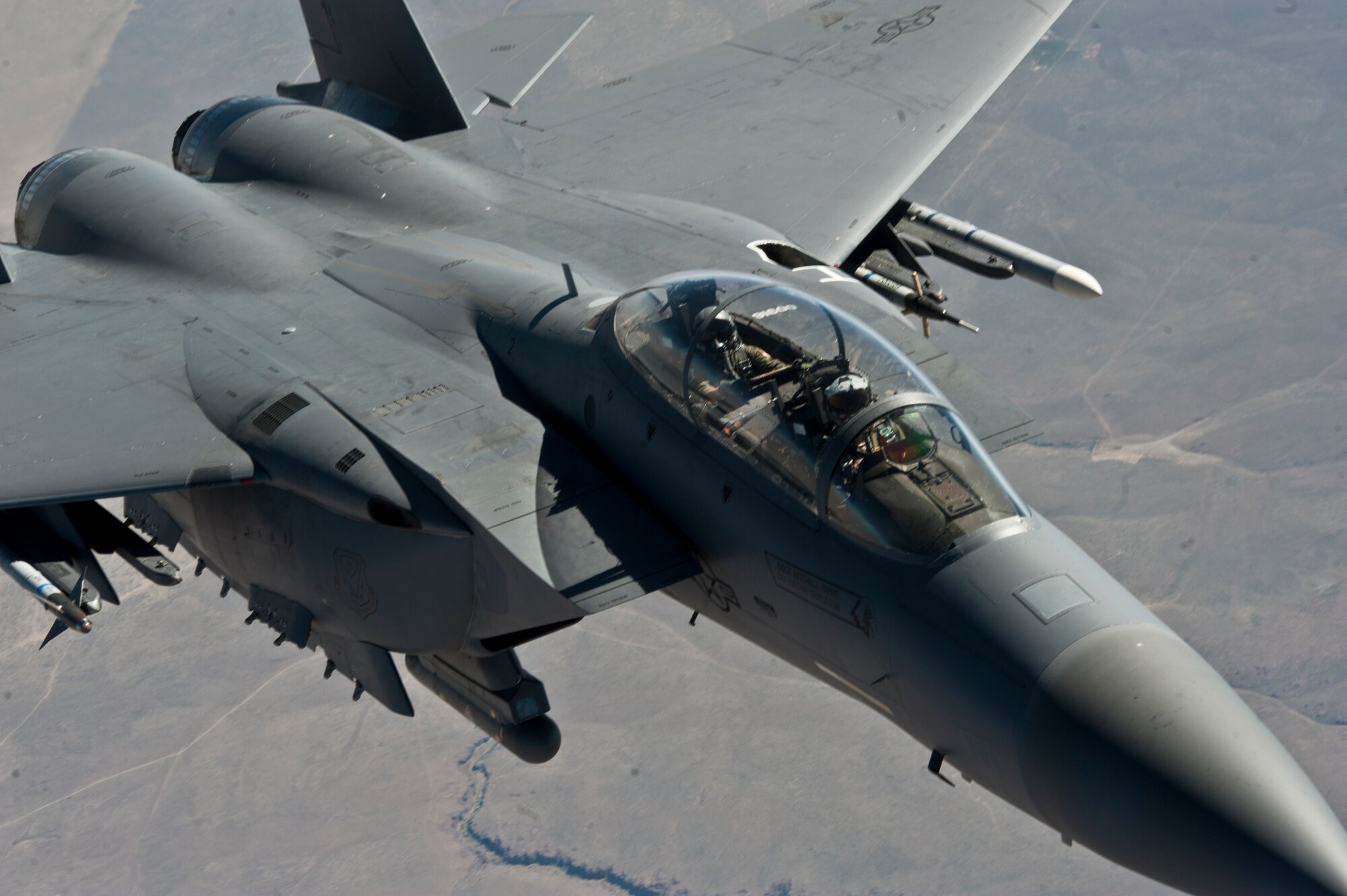 A F-15E Strike Eagle soars over the inland northwest after getting refueled by a KC-135 Stratotanker from Fairchild AFB, Wash., June 25, 2015 over the Inland Northwest. The F-15 Strike Eagles were from Mountain Home Air Force Base, Idaho. (U.S. Air Force photo/Staff Sgt. Veronica Montes)