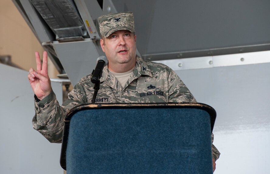 U.S. Air Force Col. Shane Barrett, 23d Maintenance Group commander, addresses the crowd after taking command of the group during the 23d MXG change of command ceremony June 25, 2015, at Moody Air Force Base, Ga. Barrett started by promising to keep his speech under two minutes. (U.S. Air Force photo by Andrea Jenkins/Released)



