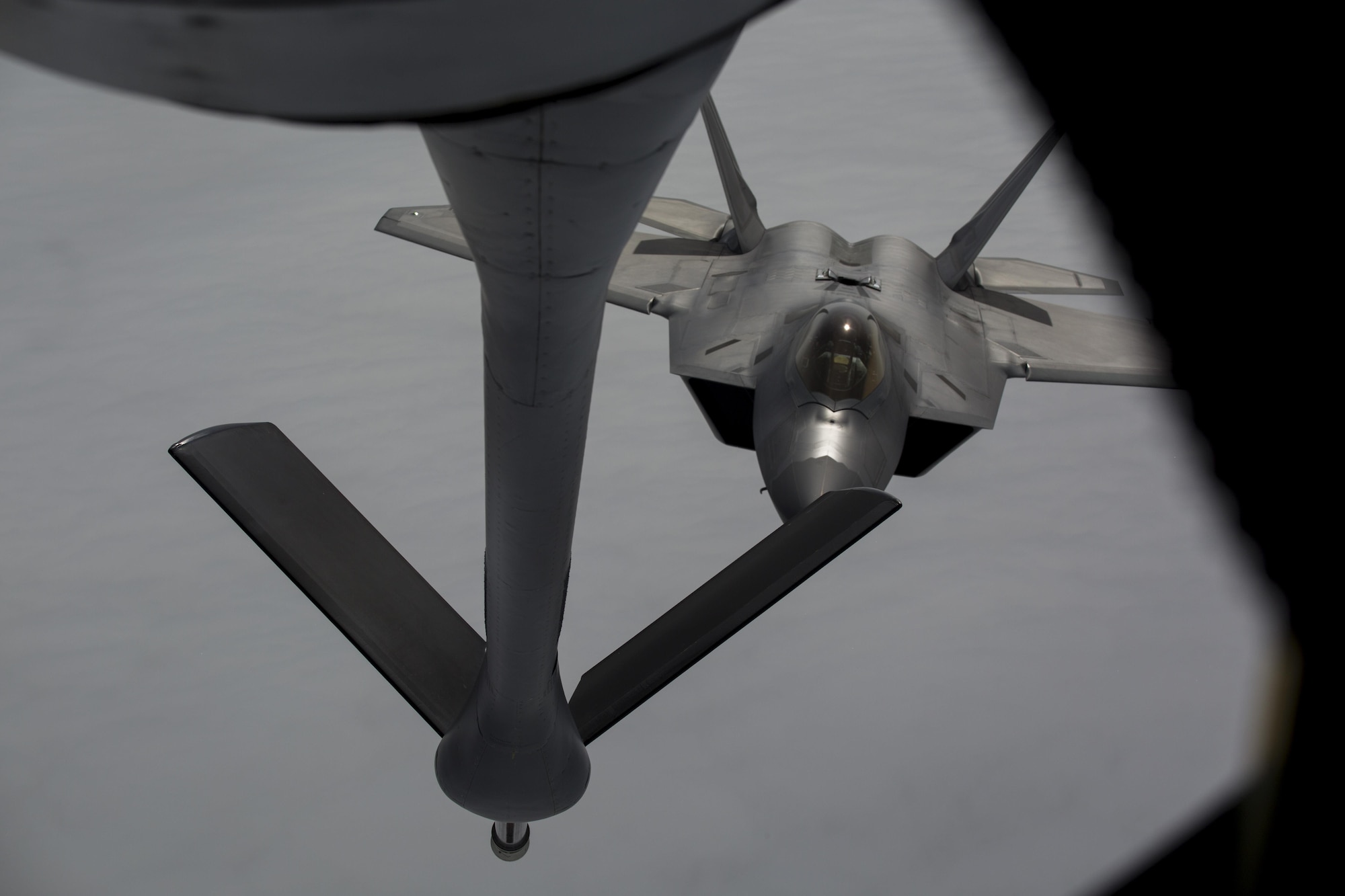 EIELSON AIR FORCE BASE, ALASKA – An F-22 Raptor prepares to refuel from a KC-135 Stratotanker from the 909th Air Refueling Squadron during Exercise Northern Edge, June 25, 2015. Northern Edge 2015 is Alaska’s premier joint training exercise designed to practice operations, tactics, techniques and procedures as well as enhance interoperability among the services. Thousands of Airmen, Soldiers, Sailors, Marines and Coast Guardsmen from active duty, reserve and National Guard units, including tankers from the 18th Air Refueling Wing out of Kadena Air Force Base, Okinawa, Japan, are involved. (U.S. Marine Corps photo by Cpl. Thor J. Larson/Released)