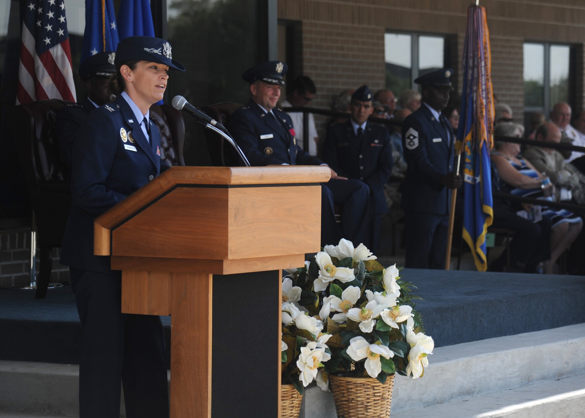 Col. Michele Edmondson, 81st Training Wing commander, gives her first speech as the 81st TRW commander during a change of command ceremony, June 26, 2015, Keesler Air Force Base, Miss. Edmondson took command of the 81st TRW from Brig. Gen. Patrick Higby. (U.S. Air Force photo by Senior Airman Holly Mansfield)