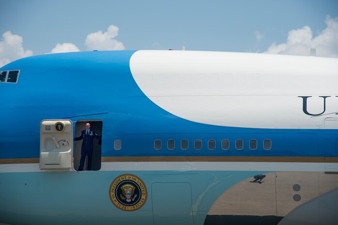 An Air Force One crew member waits for the stair truck to pull up June 26, 2015 at Joint Base Charleston, S.C. The President and First Lady attended the funeral services of Rev. Clementa Pinckney at the College of Charleston TD Arena, where President Obama delivered the eulogy. Vice President Joe Biden and Dr. Jill Biden also attended. Reverend Pinckney was one of nine people fatally shot June 17, 2015 week during a Bible study at Emanuel AME Church in Downtown Charleston.(U.S. Air Force photo/Senior Airman George Goslin)