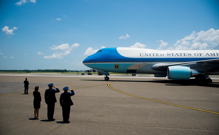 Col. Jeffrey DeVore, Joint Base Charleston commander, Col. John Lamontagne, 437th Airlift Wing commander, and his wife Becky, wait as President Barack Obama arrives with First Lady Michelle Obama on the flightline June 26, 2015 at JB Charleston, S.C. The President and First Lady attended the funeral services of Rev. Clementa Pinckney at the College of Charleston TD Arena, where President Obama delivered the eulogy. Vice President Joe Biden and Dr. Jill Biden also attended. Reverend Pinckney was one of nine people fatally shot June 17, 2015 week during a Bible study at Emanuel AME Church in Downtown Charleston.(U.S. Air Force photo/Senior Airman George Goslin)