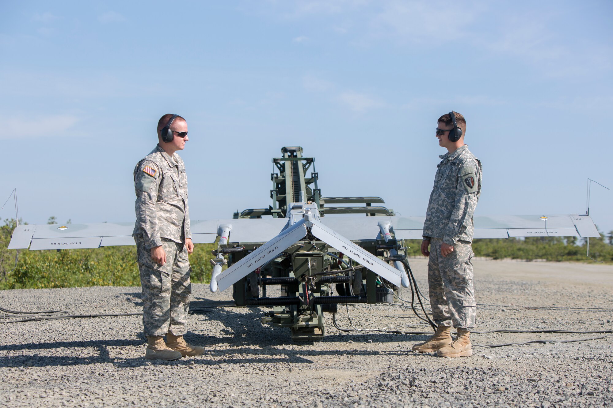 Soldiers from the 104th Brigade Engineering Battalion prepare to launch an RQ-7 Shadow unmanned aerial vehicle at Warren Grove Gunnery Range, N.J., June 17, 2015. The UAV was used to track down simulated suspected terrorists as a part of Operation Morning Coffee. Operation Morning Coffee is a joint exercise with the New Jersey Army National Guard, Air National Guard and Marine Corps Reserve. (U.S. Marine Corps photo by Lance Cpl. Stanley Moy/Released)