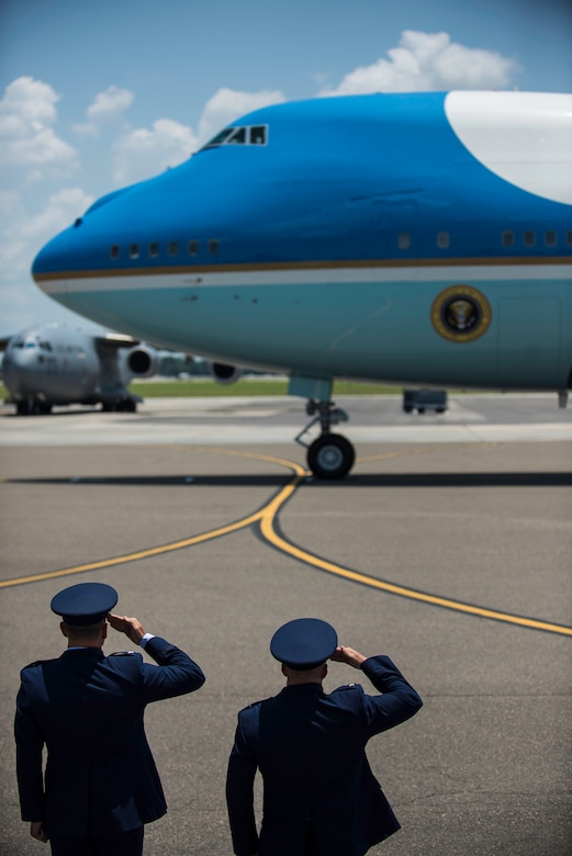 Col. Jeffrey DeVore, Joint Base Charleston commander, and Col. John Lamontagne, 437th Airlift Wing commander, salute President Barack Obama aboard Air Force One 26, 2015 at JB Charleston, S.C. The President and First Lady attended the funeral services of Rev. Clementa Pinckney at the College of Charleston TD Arena, where President Obama delivered the eulogy. Vice President Joe Biden and Dr. Jill Biden also attended. Reverend Pinckney was one of nine people fatally shot June 17, 2015 week during a Bible study at Emanuel AME Church in Downtown Charleston. (U.S. Air Force photo/Senior Airman Jared Trimarchi)