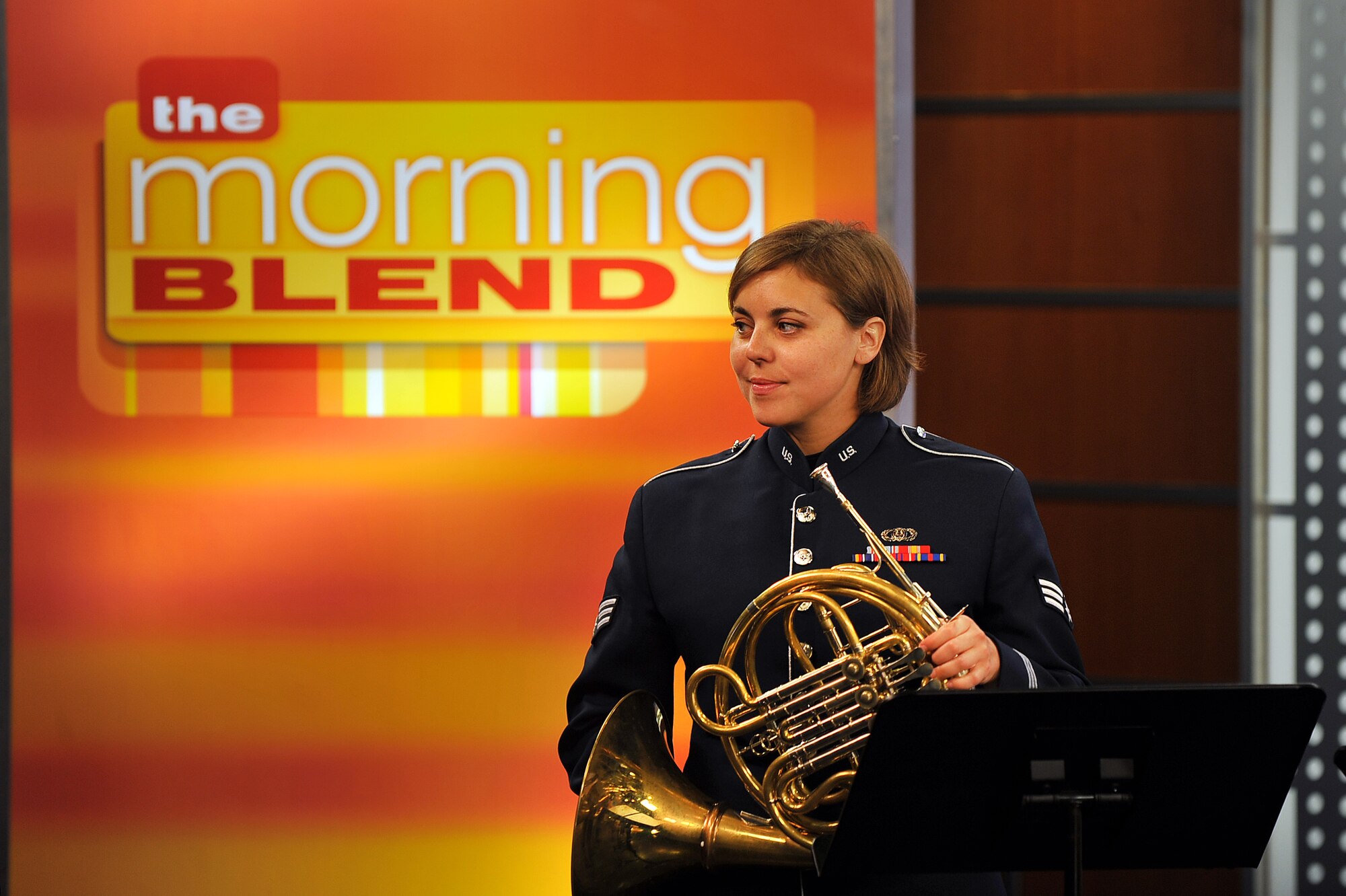 U.S. Air Force Senior Airman Alena Zidlicky, vocalist and French horn player with the U.S. Air Force Heartland of America Band, waits for her performance to begin on KMTV’s Morning Blend show June 25 at KMTV’s studio in Omaha, Nebraska. The band’s largest ensemble, “Vortex,” will perform free concerts June 27 at 7:30 p.m. at the Entertainment Plaza in Plattsmouth, Nebraska and July 3 at 7:30 p.m. at the Sumtur Amphitheater in Papillion, Nebraska. (U.S. Air Force photo by Josh Plueger/Released)