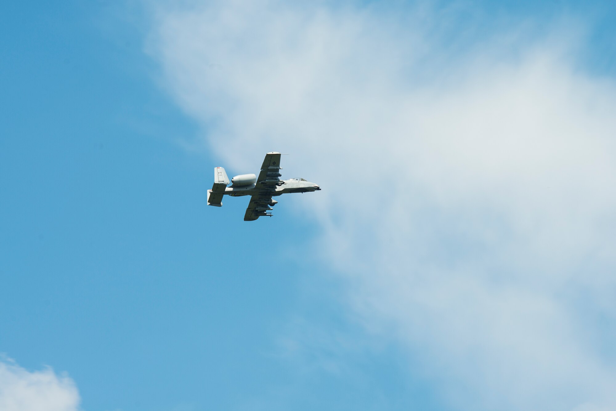 An A-10C Thunderbolt II from the 74th Fighter Squadron maneuvers after performing a strafing run during a joint training with the 7th Air Support Operations Squadron June 18, 2015, on Grand Bay Bombing and Gunnery Range at Moody Air Force Base, Ga. During the training, the tactical air control party completed requirements necessary to become certified joint terminal attack controllers. (U.S. Air Force photo by Airman 1st Class Ceaira Tinsley/Released)