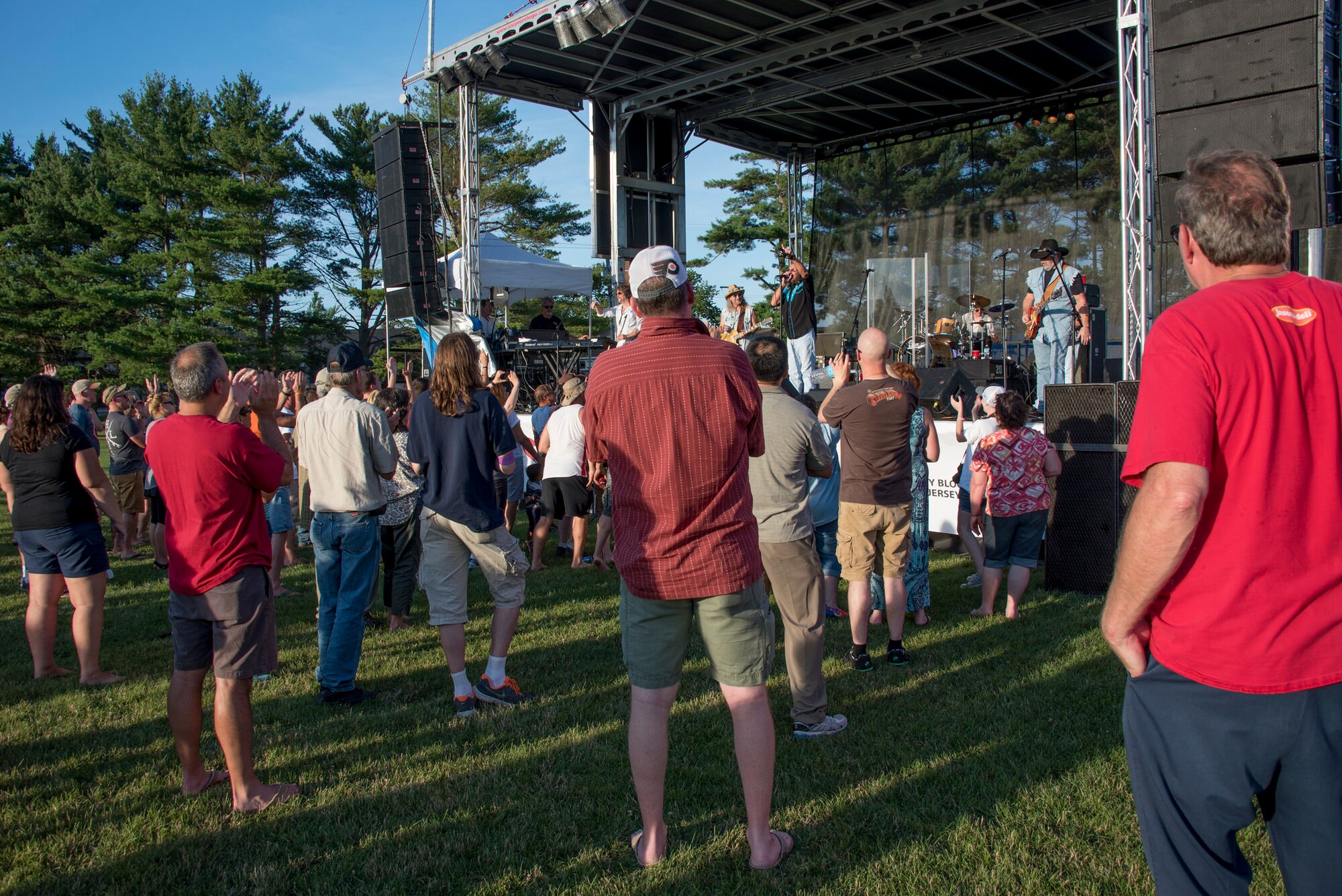 The Marshall Tucker Band entertains a crowd on Doughboy Field during the Base Backyard Barbecue on Joint Base McGuire-Dix-Lakehurst, N.J., June 24, 2015. Nearly 5,000 Defense Department employees and their families attended the first of three events in the Summer Concert Series. (U.S. Air Force photo by Senior Airman Tara Williamson/Released)