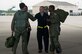 From left, 1st Lt. Jon Koritz, 335th Fighter Squadron pilot, Airmen 1st Class Thaddeus Kenebrew and Tyler Kimmell, both 4th Aircraft Maintenance Squadron crew chiefs, and 1st Lt. Desmond Ross, 336th FS weapons systems officer, shake hands before preparing for a flight, April 20, 2015, at Seymour Johnson Air Force Base, North Carolina. Air and ground crew share open dialogue between each other in case any maintenance issues with the aircraft arise. (U.S. Air Force photo/Airman Shawna L. Keyes)