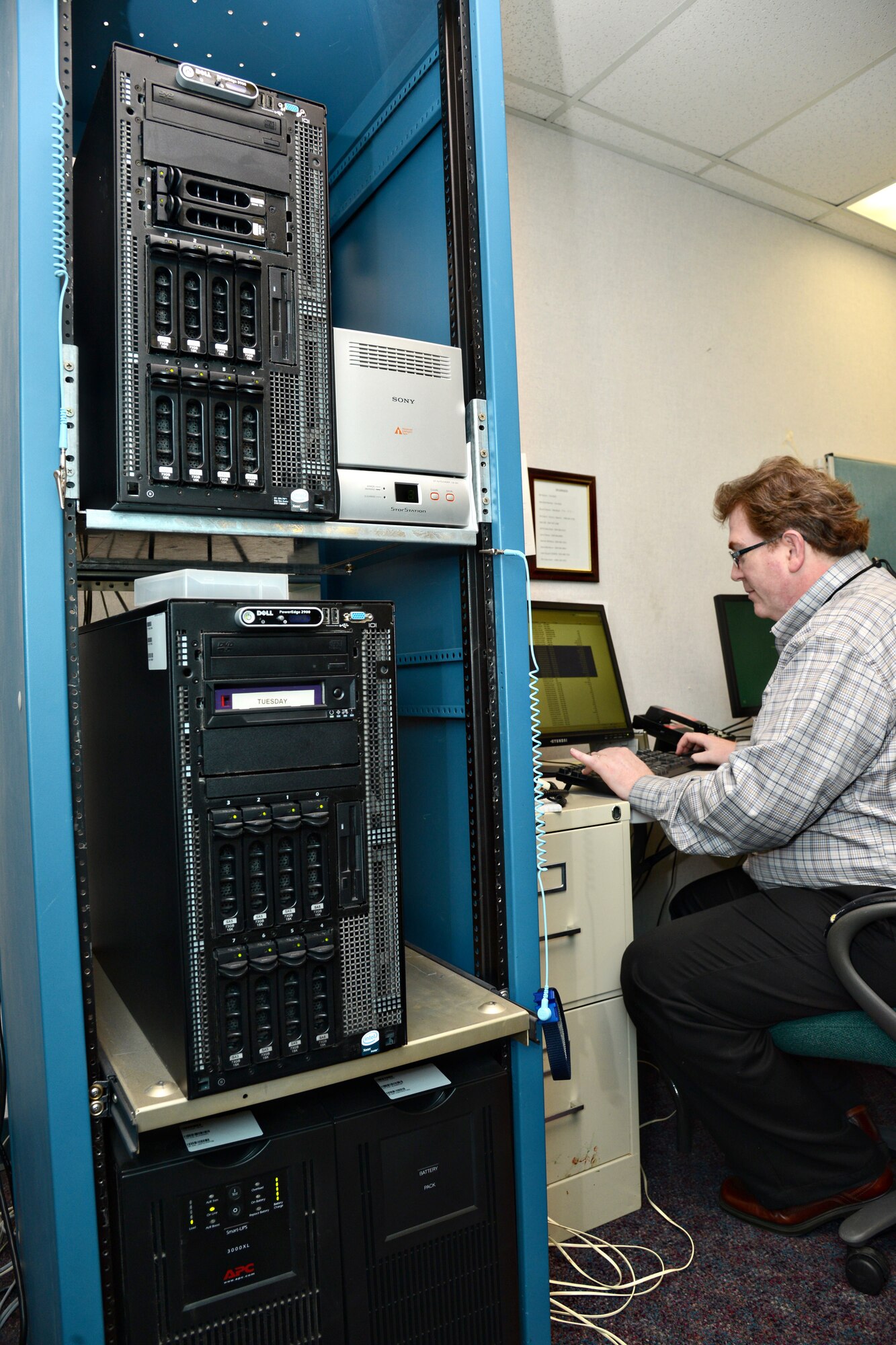 Sheldon Jones, a procurement analyst, administers the PD2: the procurement desktop defense contract writing system. (Air Force photo by Kelly White/Released)
