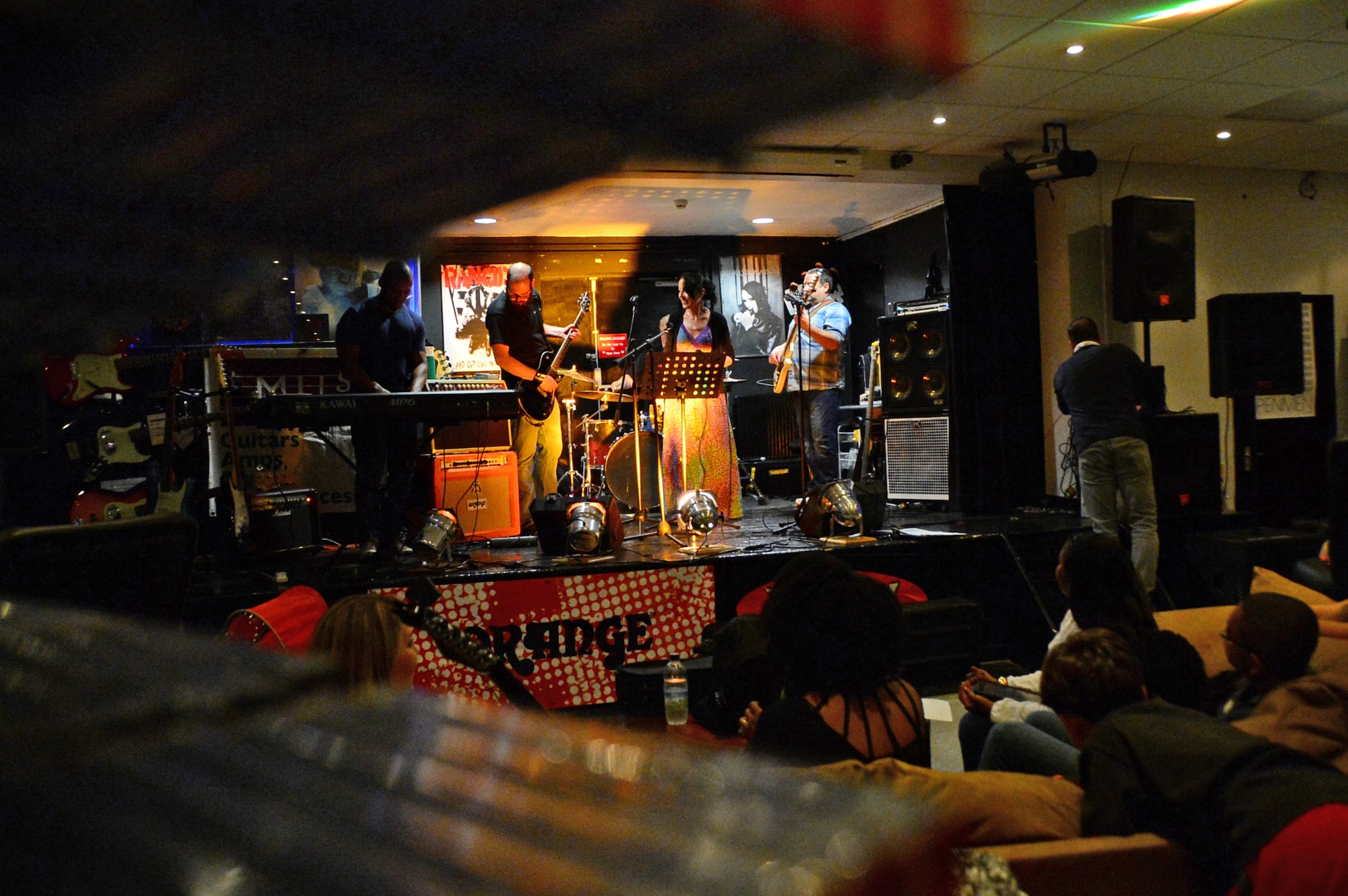 Band members perform during Electric Avenue’s Open Mic Jam Night at Royal Air Force Lakenheath, England, June 17, 2015. The event is held to encourage base personnel of all ages to show off their talents and connect with other artists. (U.S. Air Force photo by Senior Airman Erin O’Shea/Released) 
