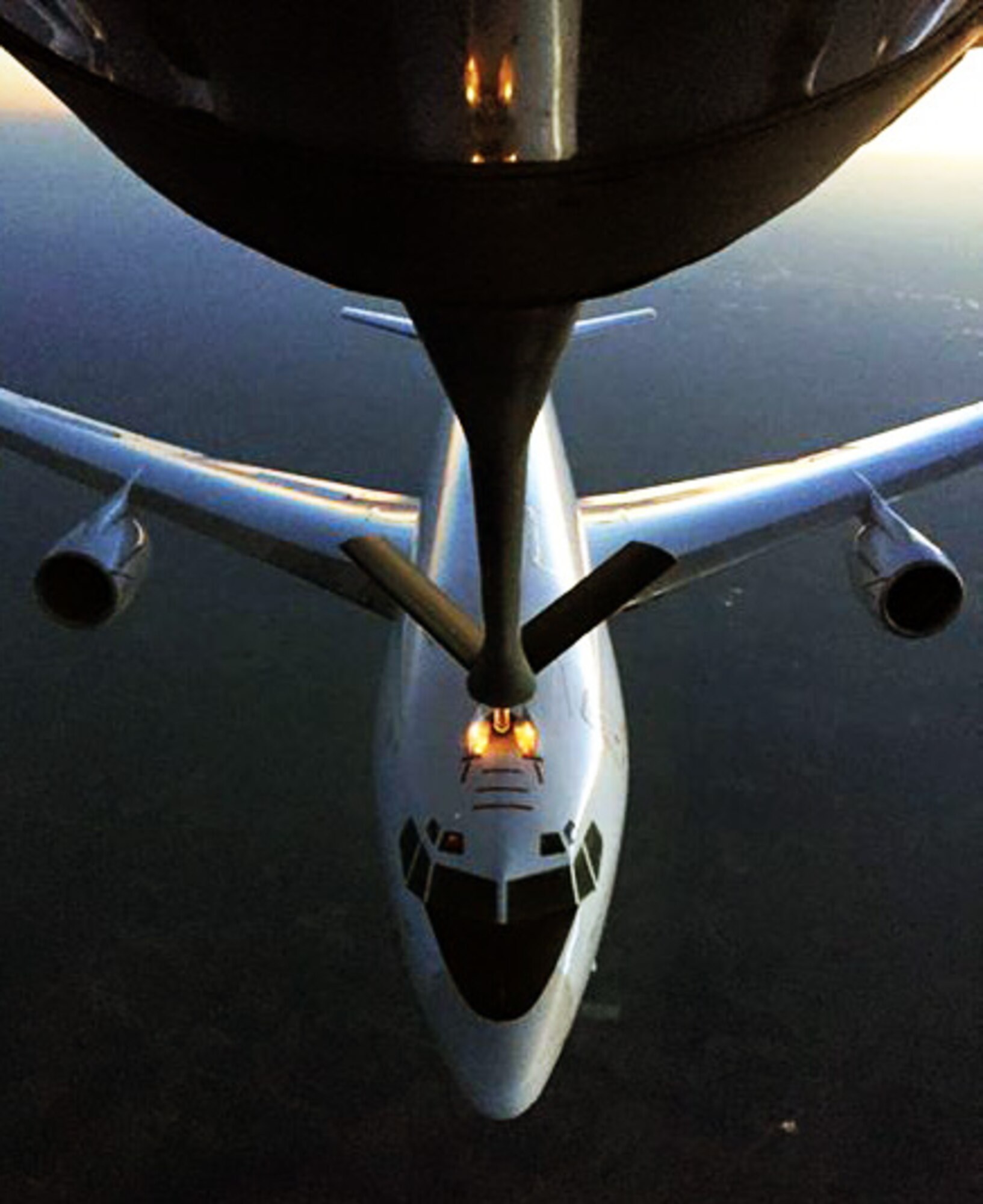 A KC-135 Stratotanker flown by a 931st Air Refueling Group aircrew refuels an E-6B Mercury aircraft from the U.S. Navy Fleet Air Reconnaissance Three at Tinker Air Force Base, Okla., is refueled by  June 26, 2015. The KC-135 offloaded approximately 10,000 pounds of fuel with 24 contacts.  (U.S. Air Force photo by Senior Master Sgt. Ray Lewis)