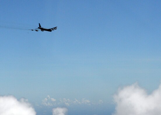 A B-52 Stratofortress from the 20th Expeditionary Bomb Squadron, flies over the Pacific Ocean June 26, 2015. Airmen from the 20th EBS dropped the final M117 bomb in the Pacific Air Force’s inventory June 26 on an uninhabited island off the coast of Guam as part of a training mission to ensure the security and stability of the Indo-Asia Pacific region. (U.S. Air Force photo by Airman 1st Class Joshua Smoot/Released)