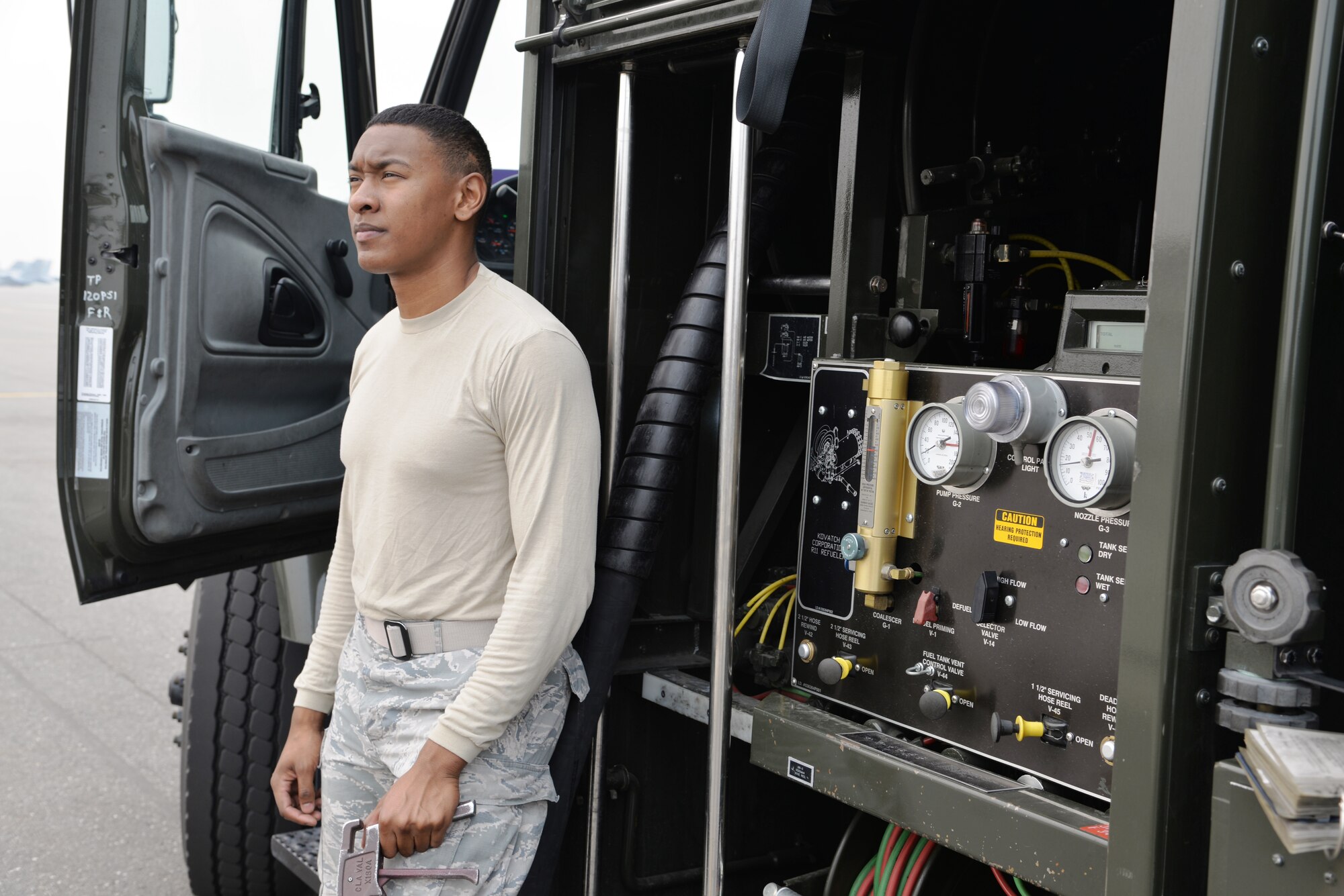 EIELSON AIR FORCE BASE, Alaska -- U.S. Air Force Airman 1st Class Anthony Jackson, a fuels management technician from the 18th Logistics Readiness Squadron, Kadena Air Base, Japan, stands by to re-fuel an F-15 Eagle after a sortie June 23, 2015, at Eielson Air Force Base, Alaska. The fuel truck, an R-11, can hold approximately 6,000 gallons of fuel. Northern Edge 2015 is Alaska’s premier joint training exercise designed to practice operations, techniques and procedures as well as enhance interoperability among the services. Thousands of participants from all the services, Airmen, Soldiers, Sailors, Marines and Coast Guardsmen from active duty, Reserve and National Guard units are involved. (U.S. Air Force photo by Staff Sgt. Kirsten Wicker/Released)  