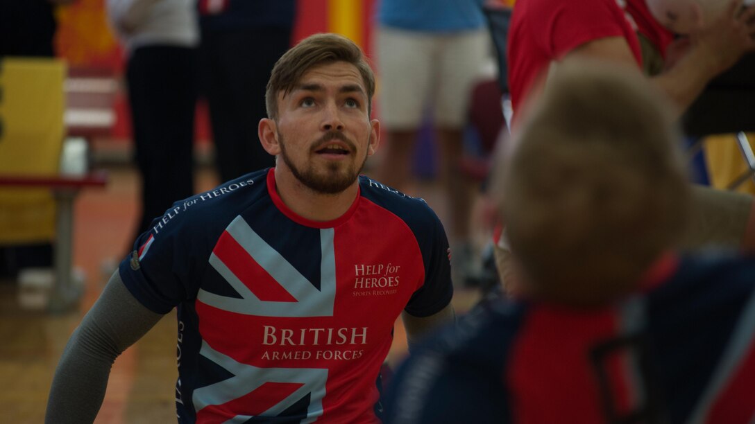 A member of Team British Armed Forces Andrew Grant participates in the 2015 Department of Defense Warrior Games sitting volleyball at Marine Corps Base Quantico, Virginia, June 19-28, 2015. The Warrior Games, founded in 2010, is a Paralympic-style competition that features eight adaptive sports for wounded, ill, and injured service members and veterans from the U.S. Army, Marine Corp, Navy/Coast Guard, Air Force, Special Operations Command, and the British Armed Forces. This year marks the first time the DoD takes responsibility for operational planning and coordination of the event, in which approximately 250 athletes are expected to compete. 