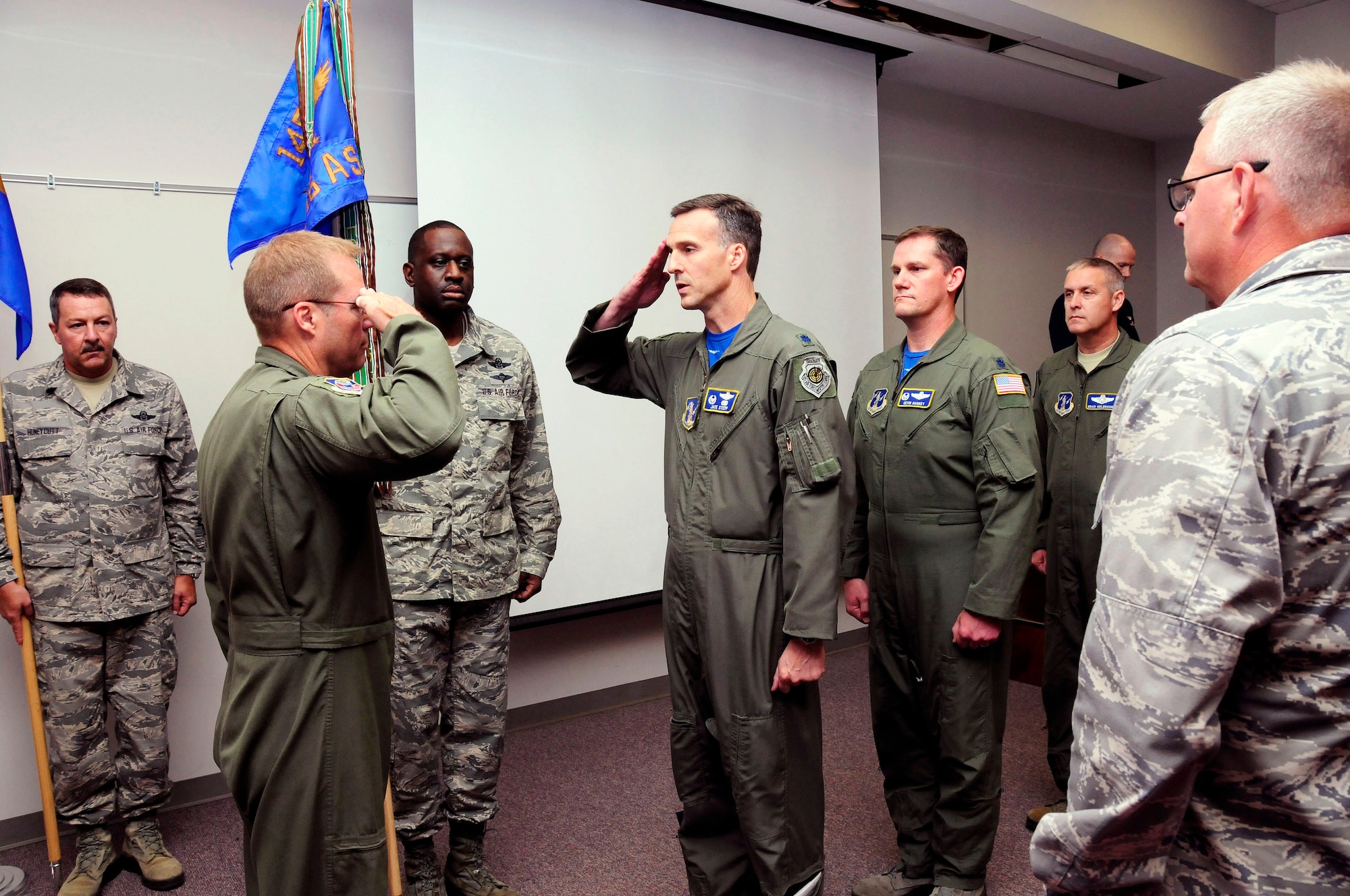 U.S. Air Force Col. Charles D. Davis III, commander of the 145th Operations Group, officiates over a change of command ceremony, as Lt. Col. Joseph H. Stepp IV relinquishes command of the 156th Airlift Squadron, June 6, 2015, at the North Carolina Air National Guard Base, Charlotte Douglas International Airport. (U.S. Air National Guard photo by Master Sgt. Patricia F. Moran, 145th Public Affairs/Released)