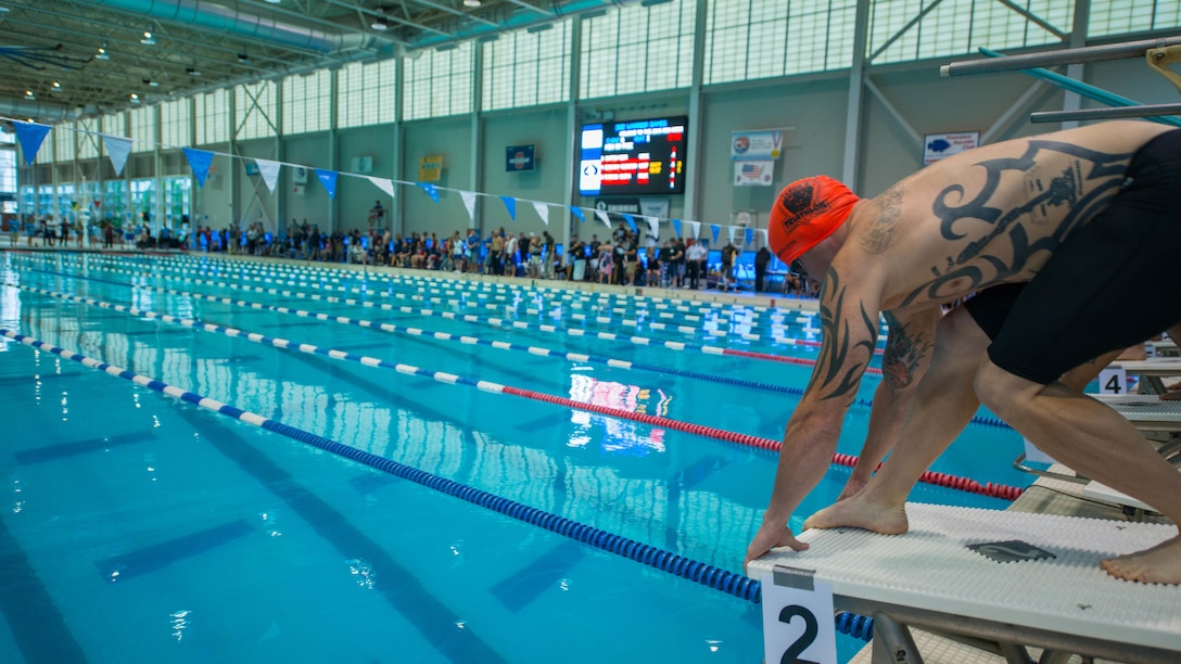 U.S. Marine Corps veteran Justin Wess competes during the swimming finals at the Freedom Aquatic and Freedom Center in Manassas, Virginia, June 27, 2015. Wess is a member of the 2015 Department of Defense (DoD) Warrior Games All-Marine Team. The 2015 DoD Warrior Games, held at Marine Corps Base Quantico June 19-28, is an adaptive sports competition for wounded, ill, and injured Service members and veterans from the U.S. Army, Marine Corps, Navy, Air Force, Special Operations Command, and the British Armed Forces. 