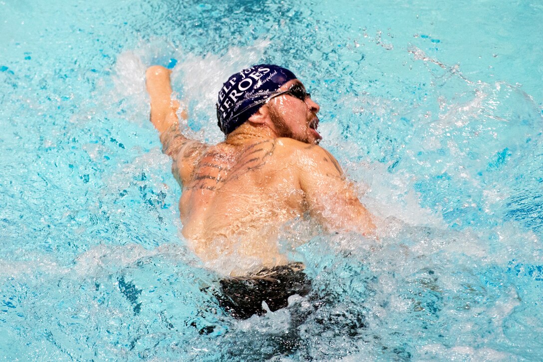 British athlete Andy Grant swims freestyle during the 2015 Department of Defense Warrior Games in Manassas, Va., June 27, 2015.