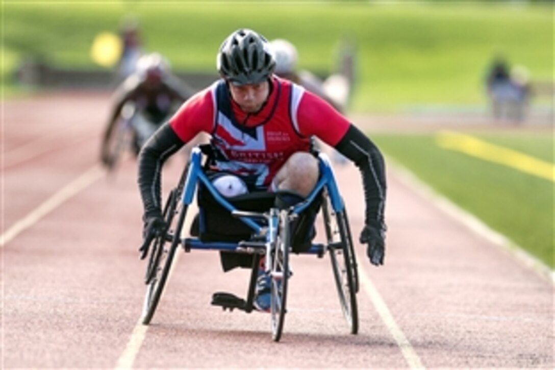 United Kingdom’s Gareth Golightly races a wheelchair during the track competition on the final day of the  2015 Department of Defense Warrior Games at Marine Corps Base Quantico, Va., June 28, 2015. 