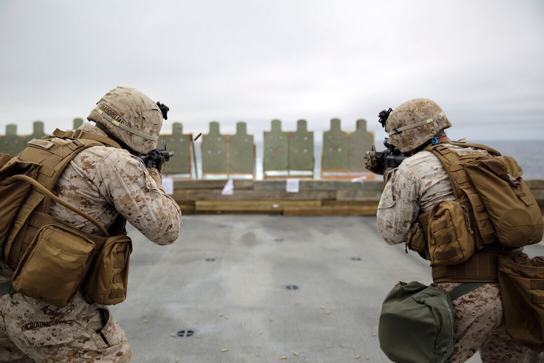 Marines with Charlie Company, 1st Battalion, 6th Marine Regiment sustain combat-marksmanship skills on the flight deck of the USS San Antonio as it crosses the Atlantic Ocean on the way to BALTOPS 2015 May 31, 2015. Seventeen NATO and partner nations will participate in the 43rd iteration of the multinational maritime exercise BALTOPS 2015 in Poland, Sweden, Germany, and throughout the Baltic Sea, June 5-20, 2015.