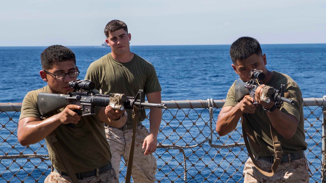 U.S. Marines with Company A, 1st Battalion, 4th Marine Regiment, Marine Rotational Force – Darwin, rehearse weapon presentation and four-man room clearing tactics and procedures aboard the USNS Sacagawea June 20, 2015 in Dili, East Timor in preparation for Exercise Koa Moana 15.2. The platoon of Marines will be conducting a bilateral exercise with the East Timor Defence Force, focusing on individual-level fundamentals to build proficiency in complex squad and platoon level tasks. The bilateral training will include room clearing of buildings, urban movement and patrolling. The MRF-D six-month deployment demonstrates how the Marine Air Ground Task Force is equipped and organized to carry out national objectives in cooperation with our national and international partners.