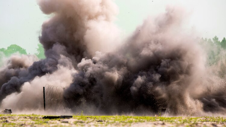 An Anti-Personnel Obstacle Breaching System detonates during the SAPPER Leaders Course at Marine Corps Base Camp Lejeune, North Carolina, June 26, 2015. The course was taught by Marines from 2nd Combat Engineer Battalion, 2nd Marine Division for service members from 4th CEB, 4th Marine Division, stationed in various parts of the U.S., and the 119th Engineer Company with the West Virginia Army National Guard. “This is more for conventional warfare, not like you would see in Iraq or Afghanistan, but down the road we need to be prepared for anything that could pop up at any time,” said Cpl. Ian Jennings, a fire team leader with 4th CEB and the course’s honor graduate. “As engineers, we need to be able to breach that obstacle so we can get the infantry in so they can do their jobs.” 