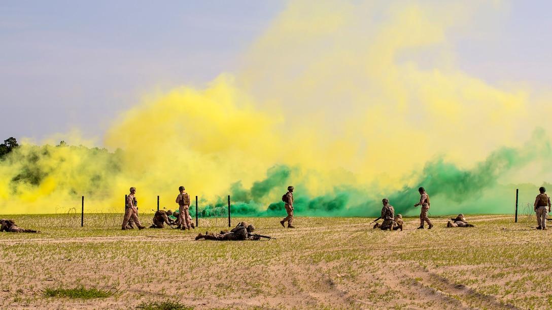 Marines with 2nd Combat Engineer Battalion, 2nd Marine Division, instruct service members from 4th CEB, 4th Marine Division, stationed in various parts of the U.S., and the 119th Engineer Company with the West Virginia Army National Guard during the SAPPER Leaders Course at Marine Corps Base Camp Lejeune, North Carolina, June 26, 2015. During the course, they used assault and breaching techniques to clear a wire obstacle using line charges with C4 explosives.