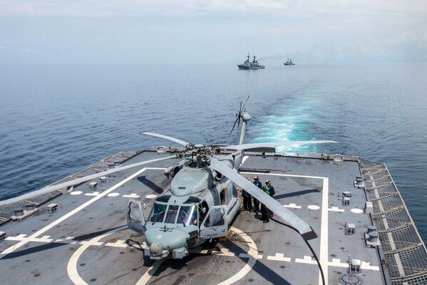 SOUTH CHINA SEA (June 24, 2015) Sailors refuel an MH-60R Sea Hawk helicopter attached to Helicopter Maritime Strike Squadron (HSM) 35 aboard the littoral combat ship USS Fort Worth (LCS 3) during a maneuvering exercise with Philippine navy ships BRP Gregorio del Pilar (PF 15) and BRP Ramon Alcaraz (PF 16) as part of Cooperation Afloat Readiness And Training (CARAT) Philippines 2015. In its 21st year, CARAT is an annual, bilateral exercise series with the U.S. Navy, U.S. Marine Corps and the armed forces of nine partner nations. 