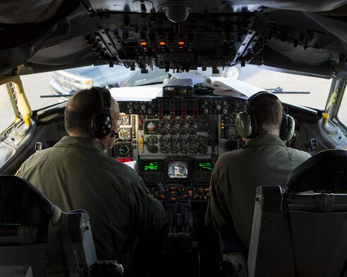U.S. Air Force Lt. Col. Kenneth W. Harris, left, and Lt. Col. Dan J. Davis, both KC-135R pilots, Air Force Reserve Command, conduct pre-flight inspections inside a U.S. Air Force KC-135T Stratotanker assigned to the 92nd Air Refueling Wing, Fairchild Air Force Base, Wash., prior to a training mission during Exercise Northern Edge 15 at Eielson Air Force Base, Alaska, June 16, 2015. Northern Edge is Alaska’s premier joint training exercise designed to practice operations, techniques and procedures as well as enhance interoperability among the services. Thousands of participants from all services, Airmen, Soldiers, Sailors, Marines and Coast Guardsmen from active duty, Reserve and National Guard units are involved. (U.S. Marine Corps photo by Cpl. Suzanne Dickson/ Released)