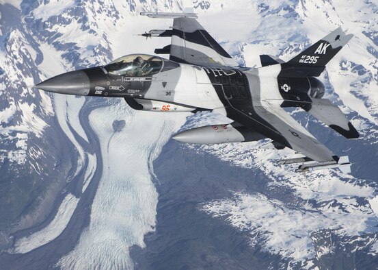 A U.S. Air Force F-16 Fighting Falcon assigned to the 354th Fighter Wing, Eielson Air Force Base, Alaska, conducts a training mission over the Joint Pacific Alaska Range Complex June 16, 2015, during Exercise Northern Edge 15. Northern Edge is Alaska’s premier joint training exercise designed to practice operations, techniques and procedures as well as enhance interoperability among the services. Thousands of service members from active duty, Reserve and National Guard units are involved. (U.S. Marine Corps photo by Cpl. Suzanne Dickson/ Released)