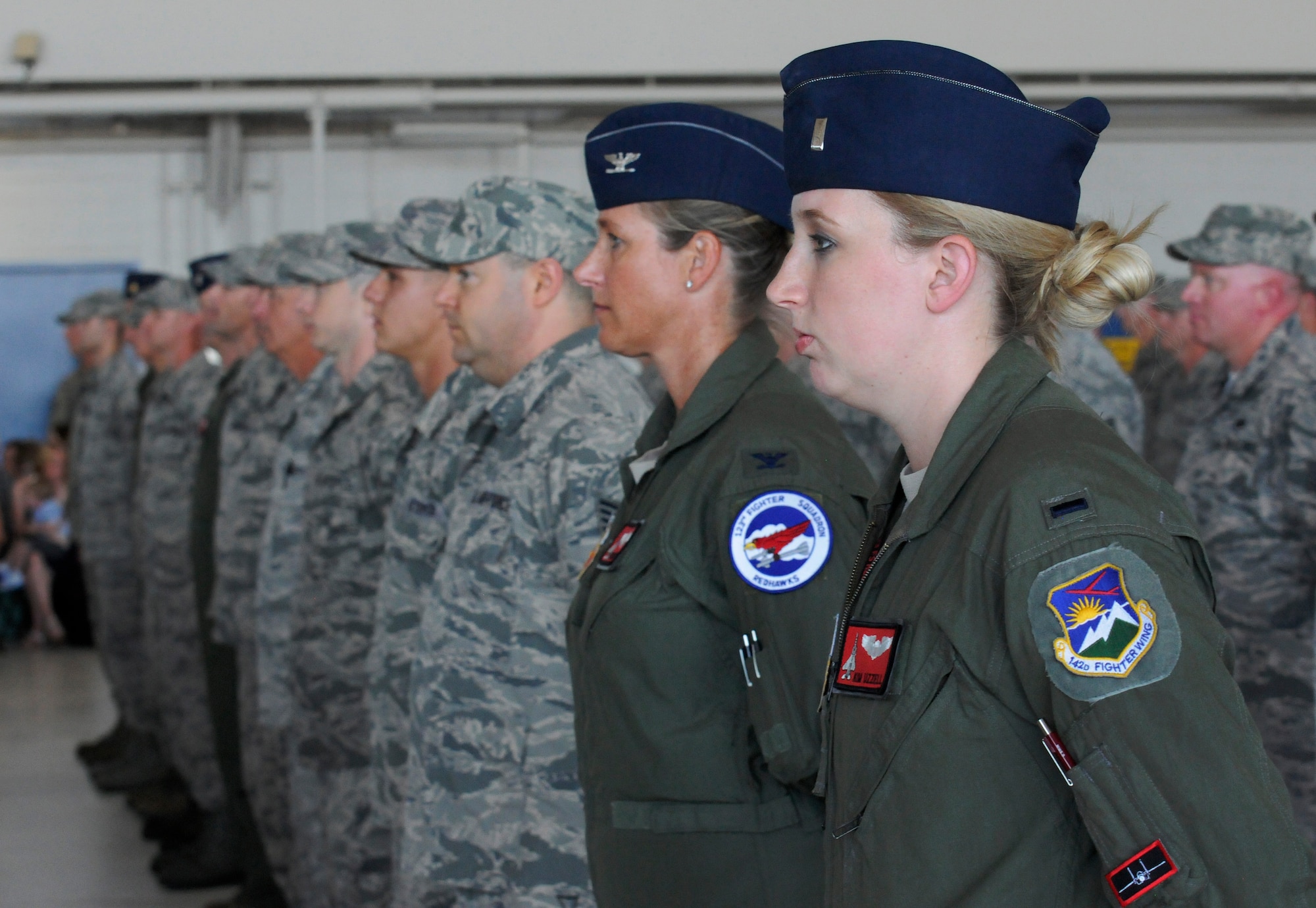 Deploying members of the 142nd Fighter Wing listen to remarks during the formal deployment mobilization ceremony June 26, 2015, Portland Air National Guard Base, Ore.   The unit is deploying to Eastern Europe in support of Operation Atlantic Resolve.  (U.S. Air National Guard photo by Tech. Sgt. John Hughel, 142nd Fighter Wing Public Affairs/Released)