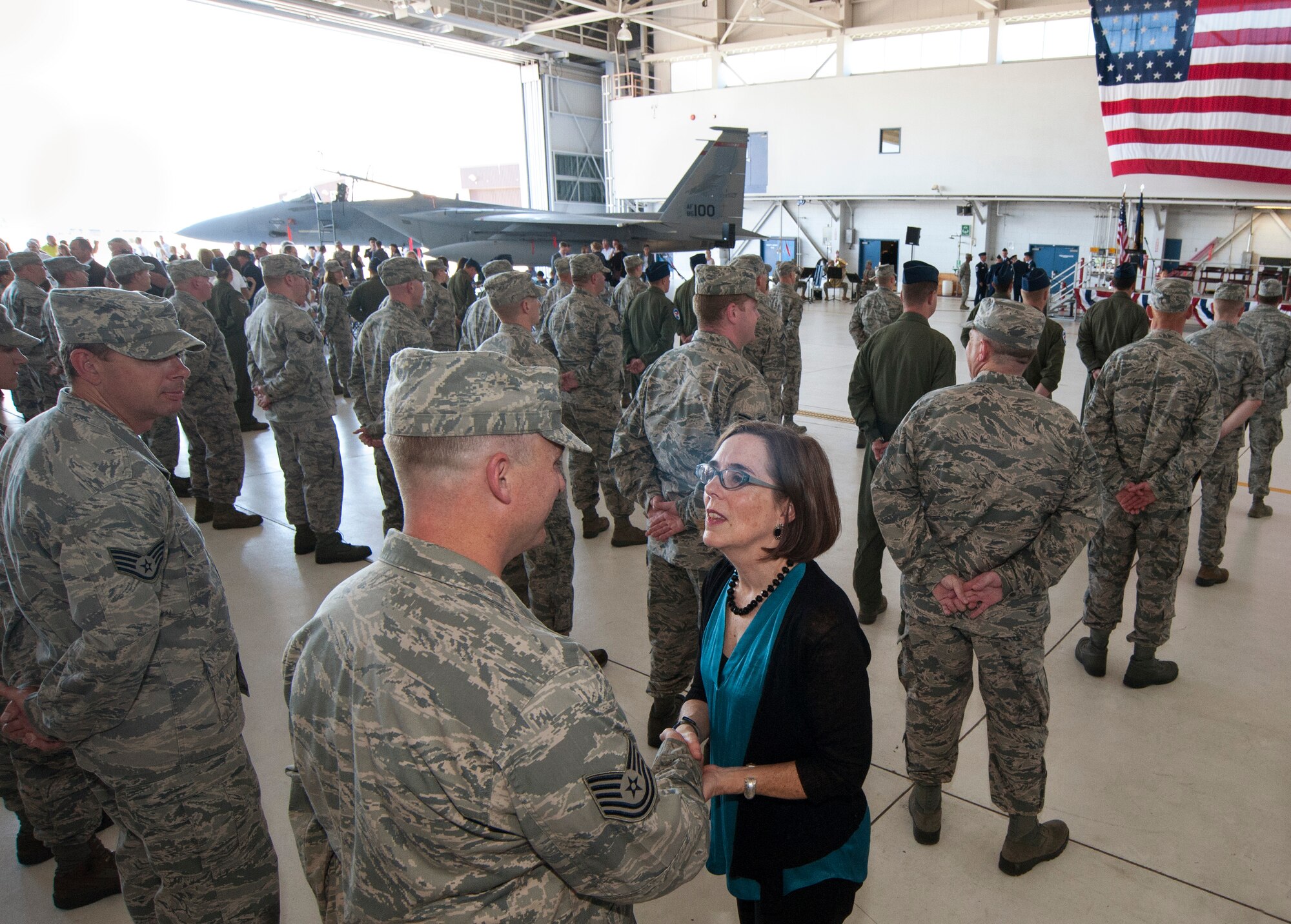 Oregon Governor Kate Brown greets deploying Airmen from the 142nd Fighter Wing following the formal mobilization ceremony, June 26, 2015, Portland Air National Guard Base, Ore.   The unit is deploying to Eastern Europe in support of Operation Atlantic Resolve.  (U.S. Air National Guard photo by Tech. Sgt. John Hughel, 142nd Fighter Wing Public Affairs/Released)