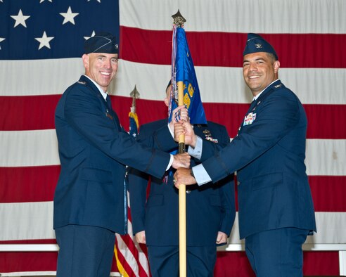 Col. Dwayne LaHaye, right, receives the 71st Mission Support Group guidon from Col. Clark Quinn, the 71st Flying Training Wing commander, during a change-of-command ceremony at Vance Air Force Base, Oklahoma, June 26. LaHaye joins Team Vance after a tour with Headquarters Air Combat Command, Joint Base Langley-Eustis, Virginia. (U.S. Air Force photo/Terry Wasson) 