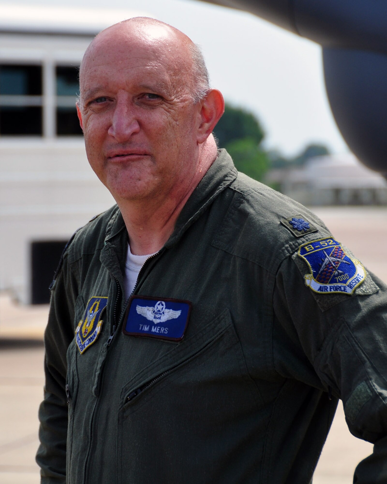 U.S. Air Force Lt. Col. Tim Mers smiles after being wet down by the Barksdale Air Force Base Fire Department. It is a tradition for the fire department to wet down an aviator upon the completion of their last flight or “Fini Flight”. Colonel Mers’ Fini Flight was on June 23, 2015 in Louisiana. He retires with over 7,000 hours in the B-52 Stratofortress as a Radar Navigator/Bombardier. (U.S. Air Force photo by Master Sgt. Laura Siebert/Released)