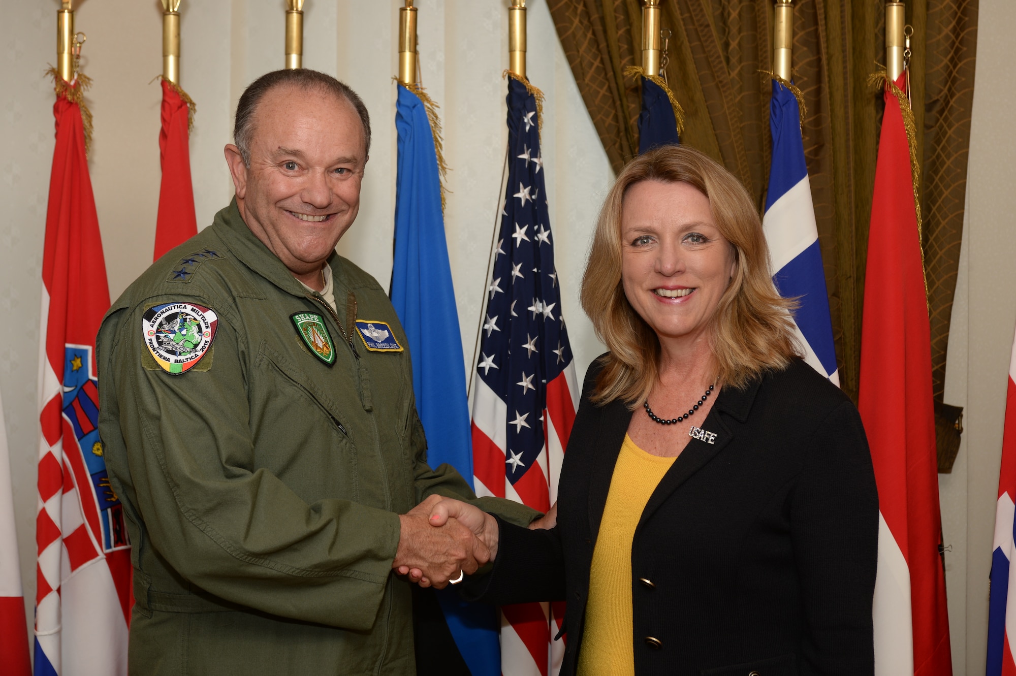 Deborah Lee James, Secretary of the U.S. Air Force, poses for a photo with U.S. Air Force Gen. Phillip Breedlove, Supreme Allied Commander Europe, during her visit to Supreme Headquarters Allied Powers Europe at Mons, Belgium, June 23, 2015. The Secretary completed a visit of installations through Europe June 24, 2015, to meet Airmen, community leaders and allied and partner nation defense chiefs. (U.S. Air Force photo by Staff Sgt. Joe W. McFadden/Released)