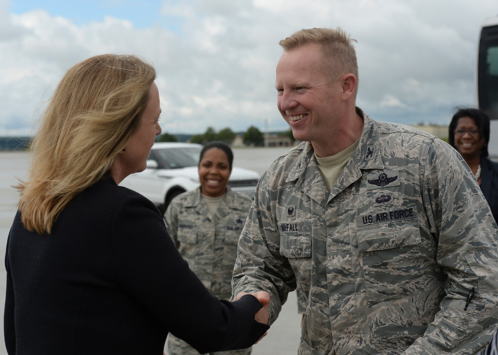 Deborah Lee James, Secretary of the U.S. Air Force, shakes the hand of U.S. Air Force Col. Joe McFall, 52nd Fighter Wing commander, during her visit of Spangdahlem Air Base, Germany, June 23, 2015. The Secretary completed a visit of installations through Europe June 24, 2015, to meet Airmen, community leaders and allied and partner nation defense chiefs. (U.S. Air Force photo by Staff Sgt. Joe W. McFadden/Released)