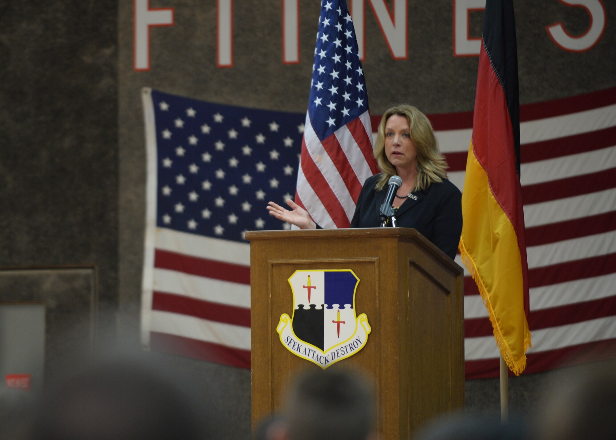 Deborah Lee James, Secretary of the U.S. Air Force, speaks to U.S. Air Force Airmen during an all-call at the Skelton Memorial Fitness Center at Spangdahlem Air Base, Germany, June 23, 2015. The Secretary completed a visit of installations through Europe June 24, 2015, to meet Airmen, community leaders and allied and partner nation defense chiefs. (U.S. Air Force photo by Staff Sgt. Joe W. McFadden/Released)

