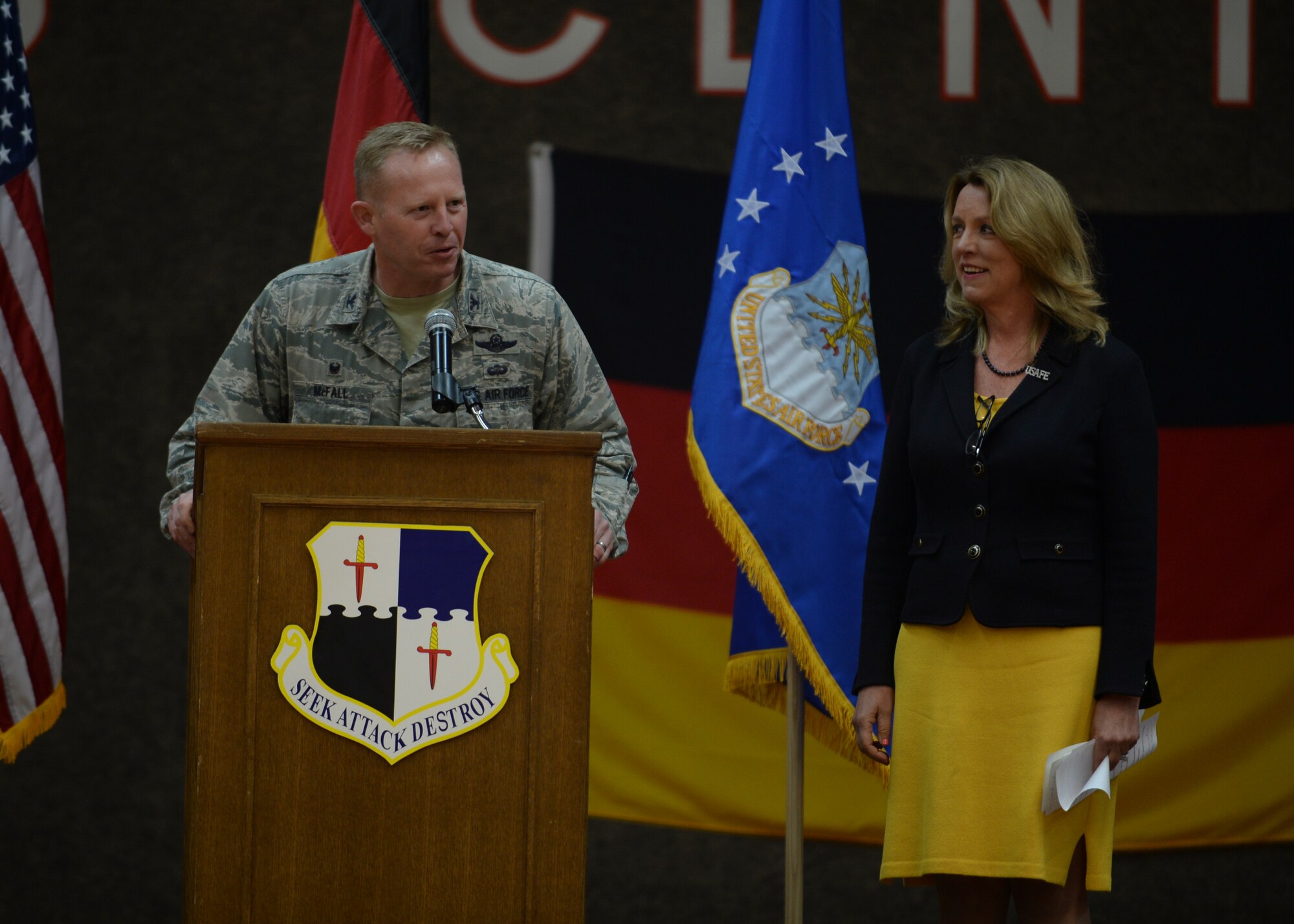 U.S. Air Force Col. Joe McFall, 52nd Fighter Wing commander, left, introduces Deborah Lee James, Secretary of the U.S. Air Force, during an all-call at the Skelton Memorial Fitness Center at Spangdahlem Air Base, Germany, June 23, 2015. The Secretary completed a visit of installations through Europe June 24, 2015, to meet Airmen, community leaders and allied and partner nation defense chiefs. (U.S. Air Force photo by Staff Sgt. Joe W. McFadden/Released)