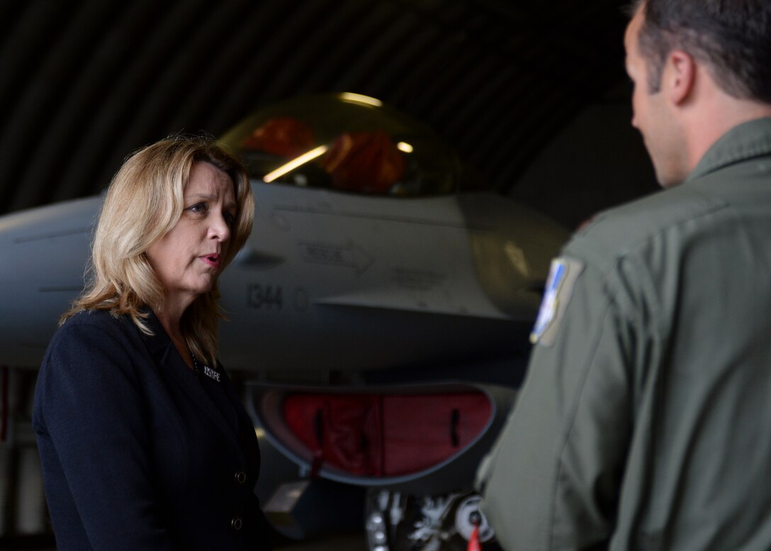 Deborah Lee James, Secretary of the U.S. Air Force, speaks with a U.S. Air Force major assigned to the 480th Fighter Squadron during her visit to the flightline at Spangdahlem Air Base, Germany, June 22, 2015. The Secretary completed a visit of installations through Europe June 24, 2015, to meet Airmen, community leaders and allied and partner nation defense chiefs. (U.S. Air Force photo by Staff Sgt. Joe W. McFadden/Released)