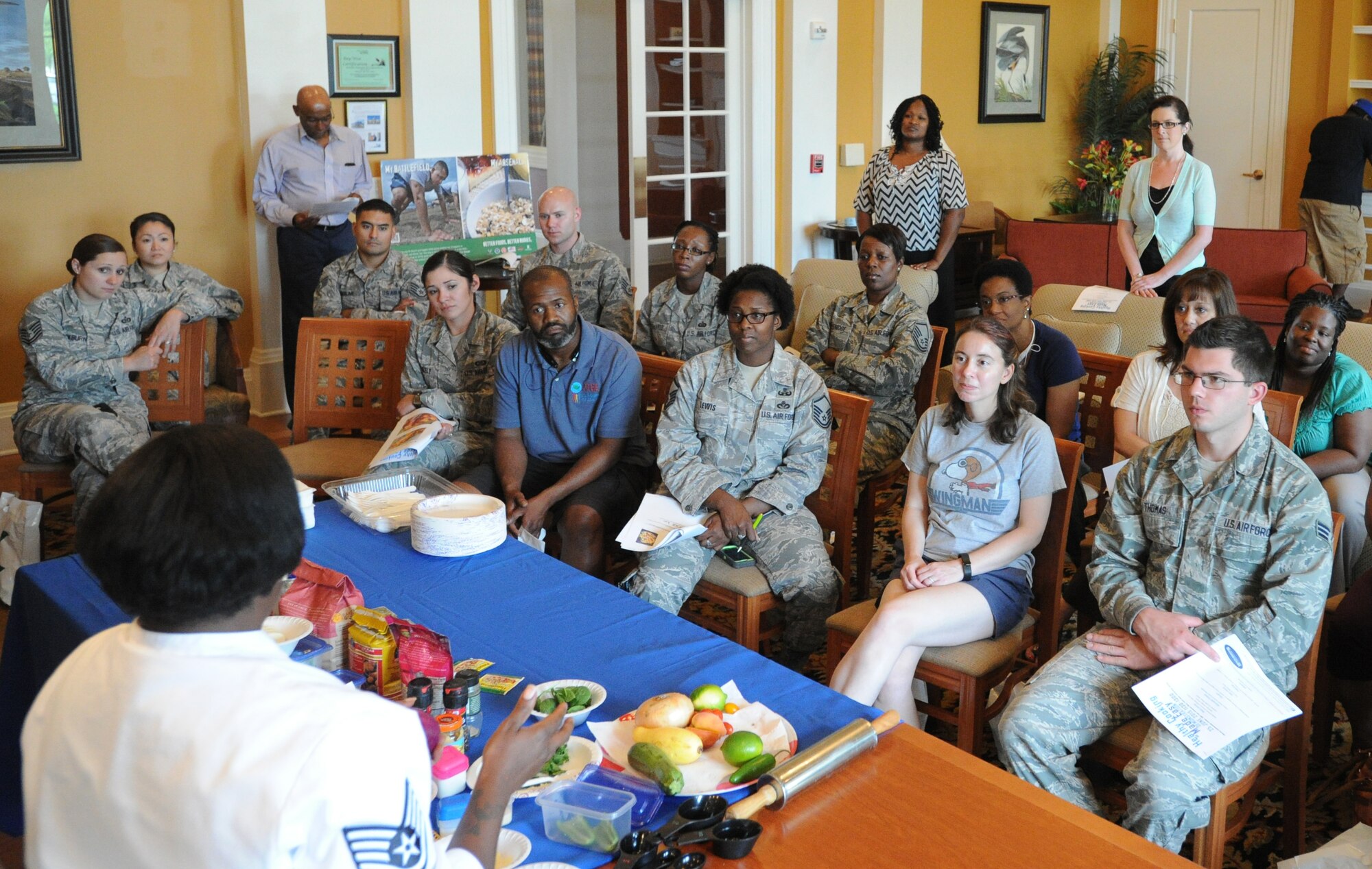 Staff Sgt. Tasha Goodrich, Air Force Enlisted Aide speaks to attendees of the Healthy Cooking Made Easy demonstration at Liberty Park Welcome Center on Joint Base Andrews, Md., June 25, 2015. (U.S. Air Force photo/ Staff Sgt. Nichelle Anderson)