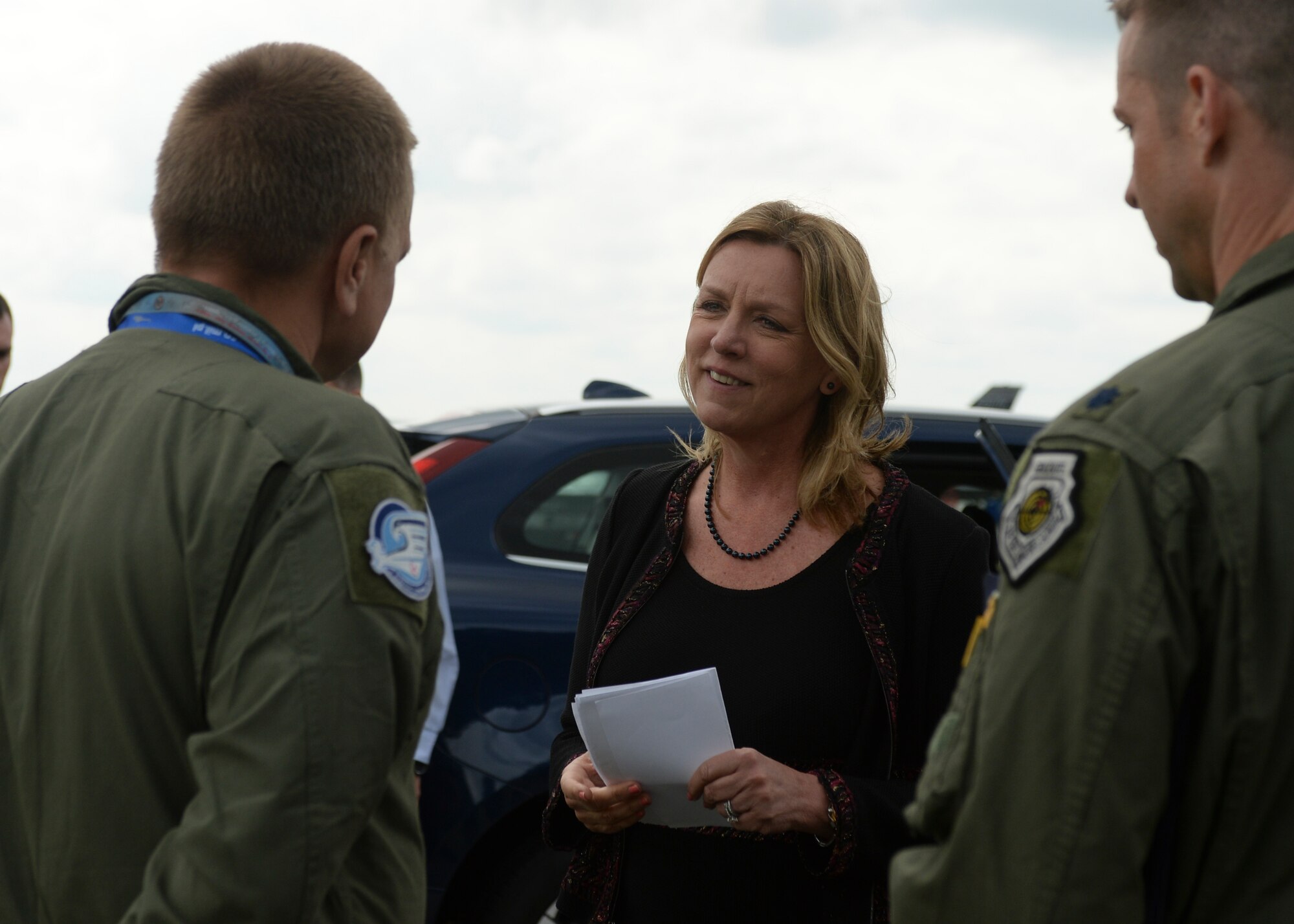 Deborah Lee James, Secretary of the U.S. Air Force, speaks Polish air force Brig. Gen. Darius Malinowski, 2nd Tactical Air Wing commander, during her visit to Lask Air Base, Poland, June 22, 2015. The Secretary completed a visit of installations through Europe June 24, 2015, to meet Airmen, community leaders and allied and partner nation defense chiefs. (U.S. Air Force photo by Staff Sgt. Joe W. McFadden/Released)