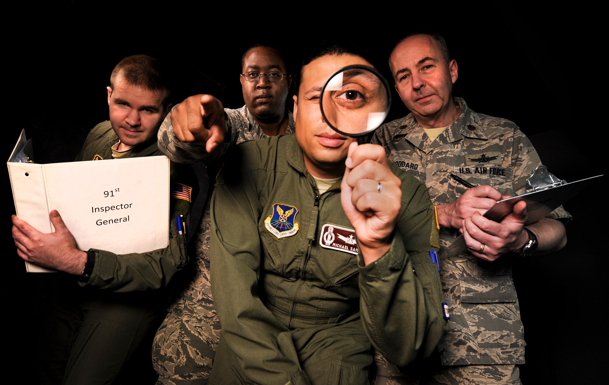 Members of the 91st Missile Wing Inspector General’s office pose for a group photo at Minot Air Force Base, N.D., June 25, 2015. The IG’s mission is to validate and verify self-assessment programs and independently assess the performance of the wing and its component organizations. (U.S. Air Force photo/Senior Airman Stephanie Morris)