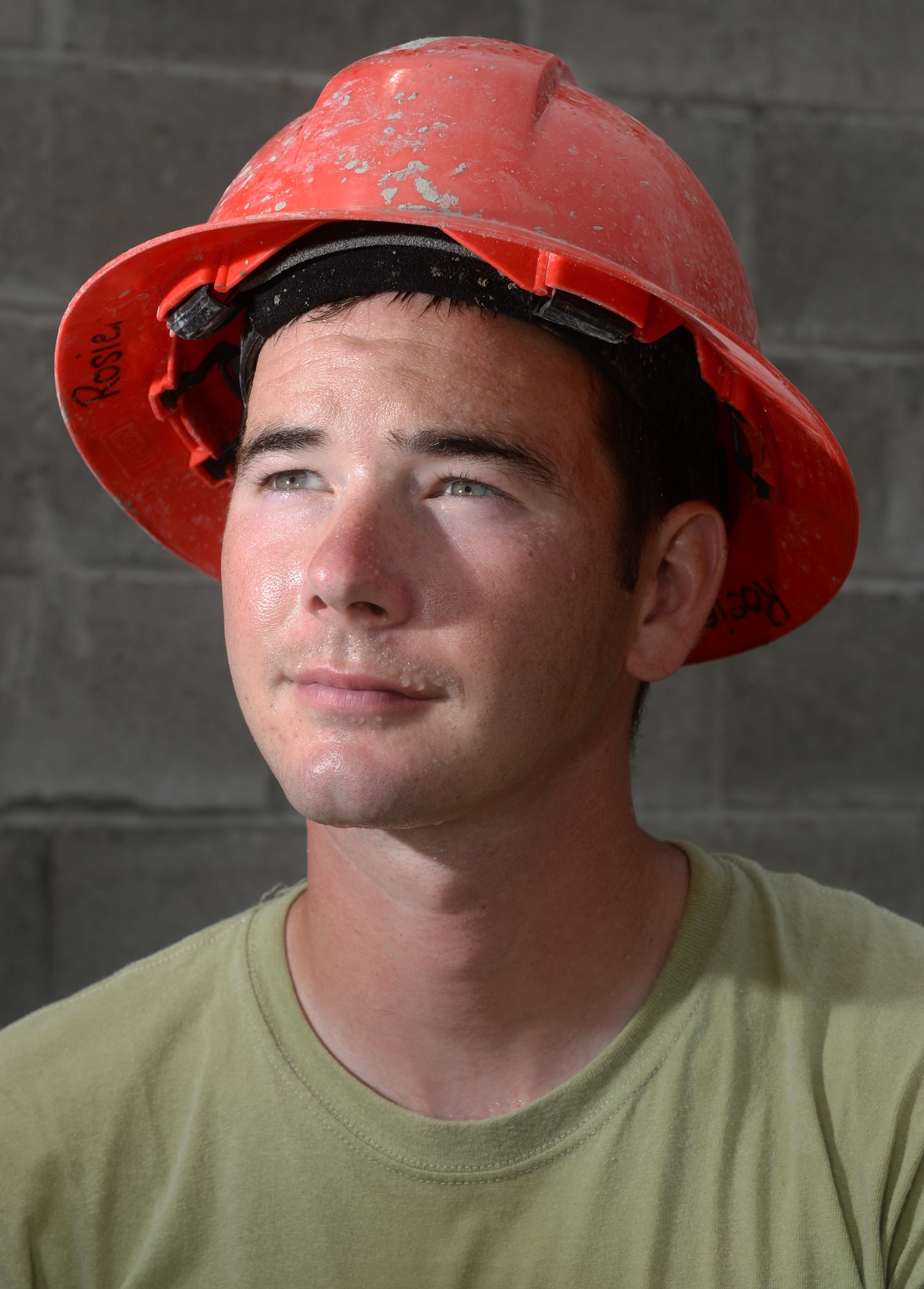 U.S. Air Force Staff Sgt. Nathan Rosier, 823rd Expeditionary RED HORSE Squadron structural craftsman,  poses for a photo at the Gabriela Mistral construction site in the village of Ocotes Alto near Trujillo, Honduras, June 24, 2015. Rosier is one of many personnel working on a new two-classroom schoolhouse, which is part of NEW HORIZONS Honduras 2015, an annual humanitarian and training exercise put on by U.S. Southern Command. NEW HORIZONS was launched in the 1980s and is an annual joint humanitarian assistance exercise that U.S. Southern Command conducts with a partner nation in Central America, South America or the Caribbean. The exercise improves joint training readiness of U.S. and partner nation civil engineers, medical professionals and support personnel through humanitarian assistance activities. (U.S. Air Force photo by Capt. David J. Murphy/Released)