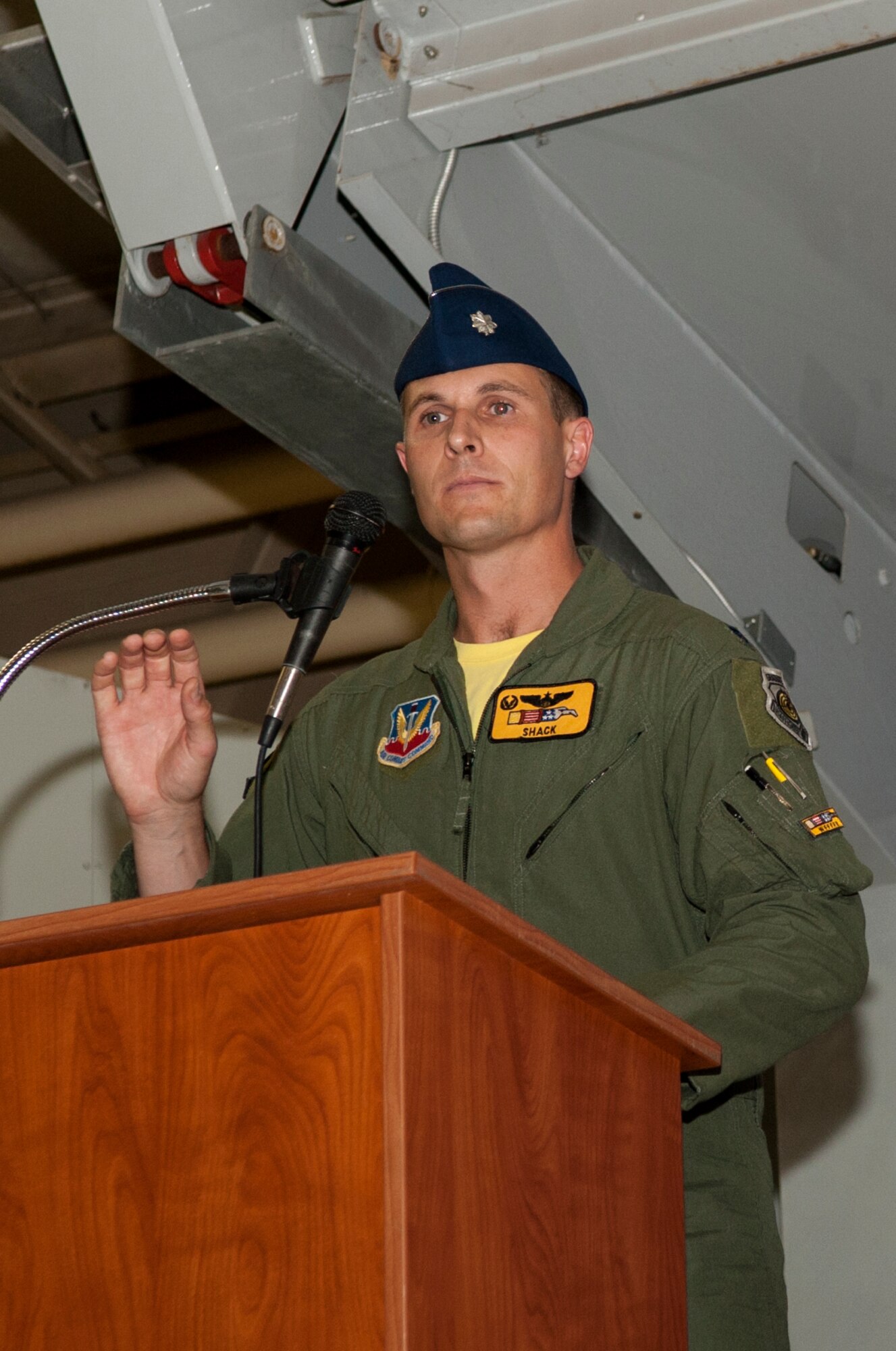 Lt. Col. Lucas Teel, incoming 336th Fighter Squadron commander, speaks to family, friends, and his new troops after accepting command, June 26, 2015, at Seymour Johnson Air Force Base, North Carolina. Teel shared his vision for the future of the squadron with his new Airmen. (U.S. Air Force photo/Airman Shawna L. Keyes) 