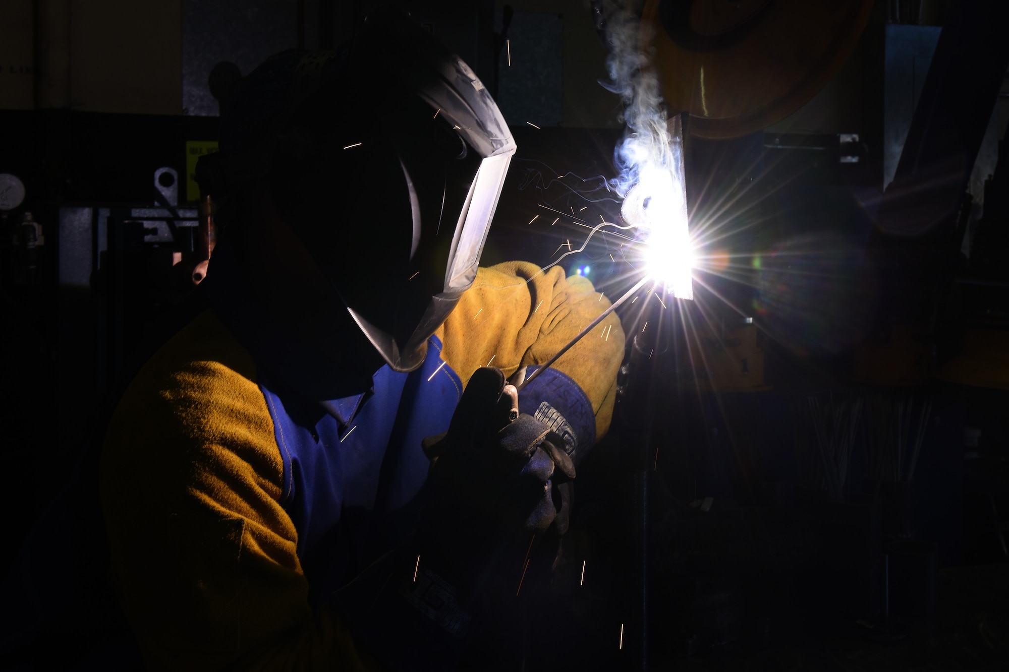 Staff Sgt. Matthew Morrish, 341st Civil Engineer Squadron metal shop NCO in charge, welds metal for a structural project June 26, 2015, at Malmstrom Air Force Base, Mont. The 341st CES operates, constructs, and maintains major facilities valued at $2.2 billion, and missile complex site facilities valued at $1.6 billion covering 13,800 square miles. (U.S. Air Force photo/Chris Willis)